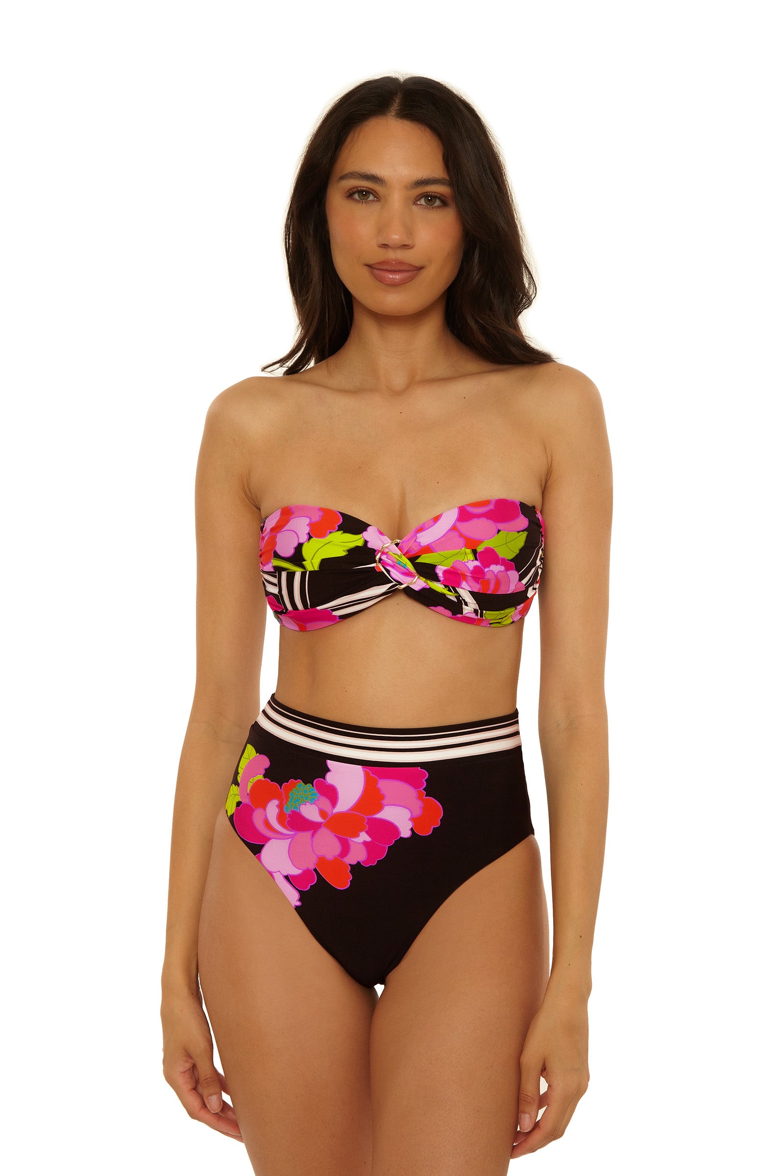 A woman wears the Twist Bandeau Swim Top in Bougainvillea Swim Knit with high-waisted bottoms, standing facing forward against a white backdrop.