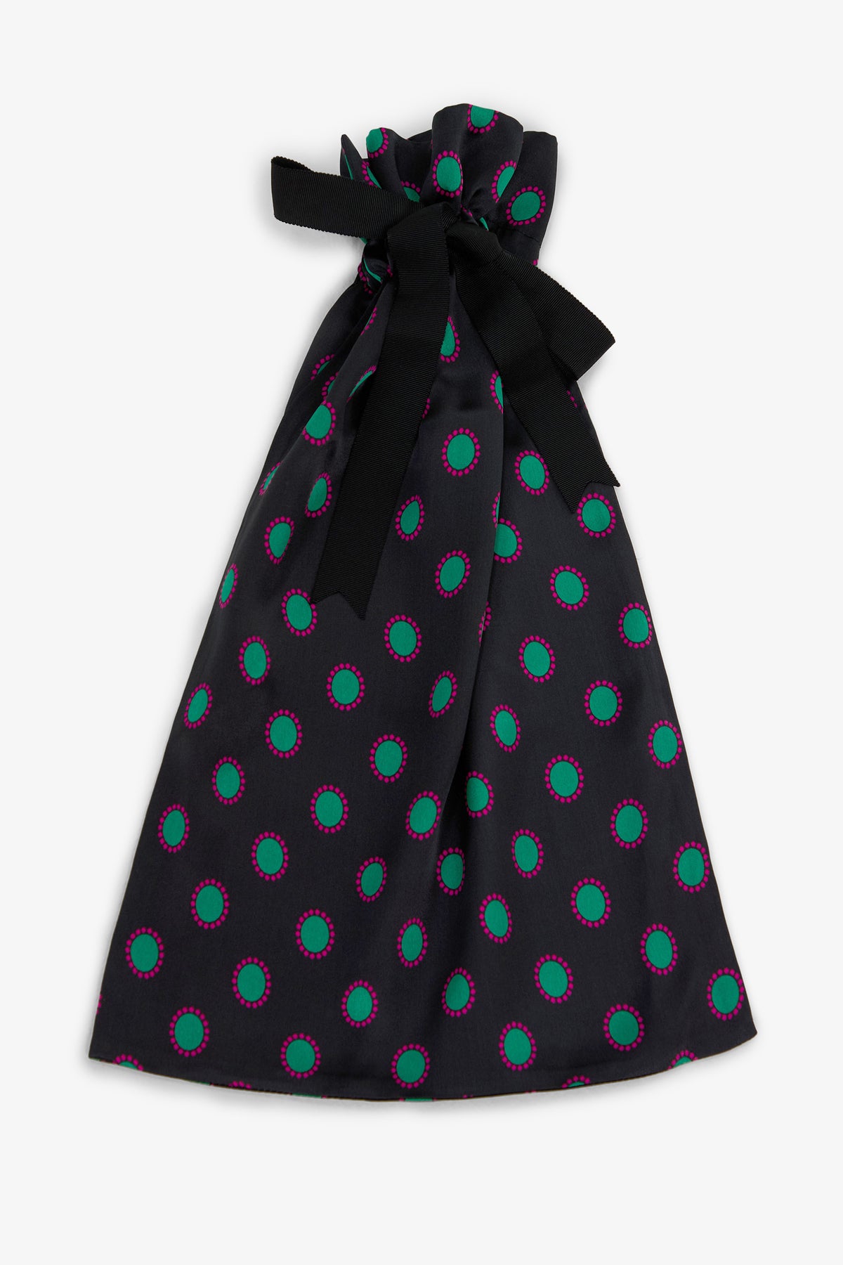 GEMSTONE PAJAMA GIFT BAG in black featuring a repeating pattern of green circles outlined in pink, tied at the top with a black ribbon.