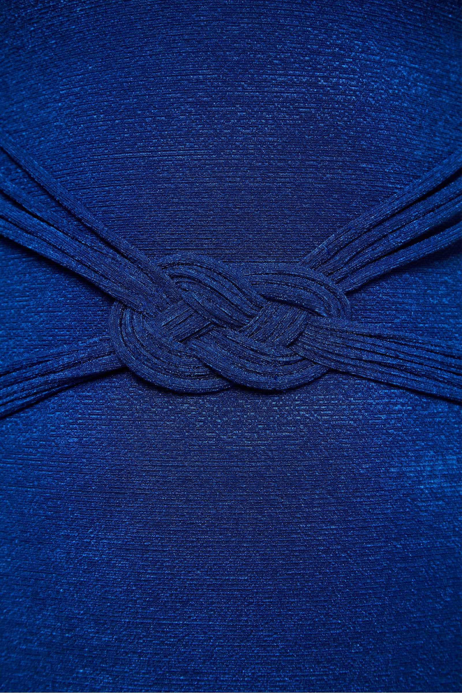 Close-up of the Crete Crepe Braided Belt 1Pc in textured royal blue fabric, featuring multiple bands intricately knotted at the center.