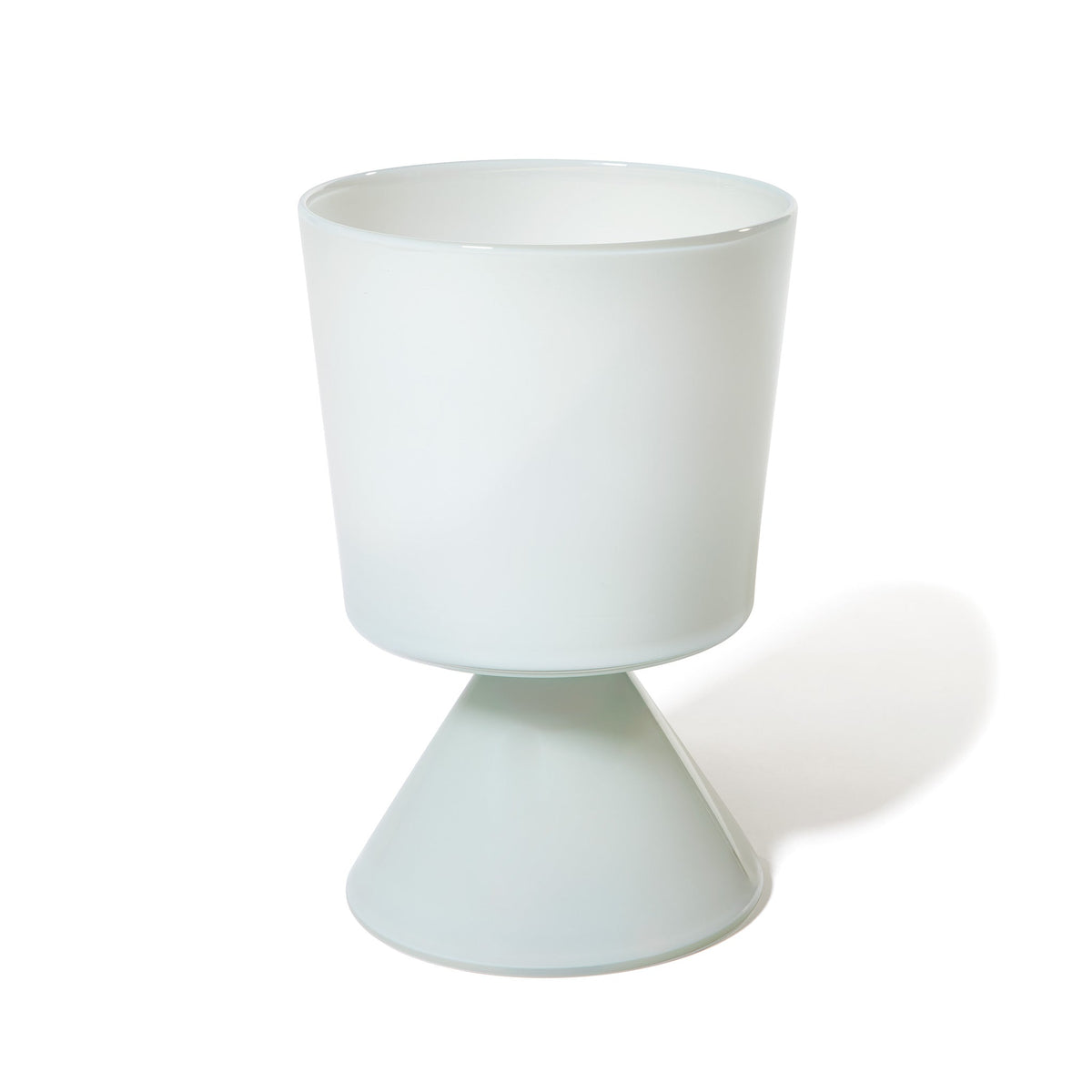 The Fiorelli Low Taper planter in Ash features a modern, minimalist design with a cylindrical top and a cone-shaped base, showcased against a plain white background.