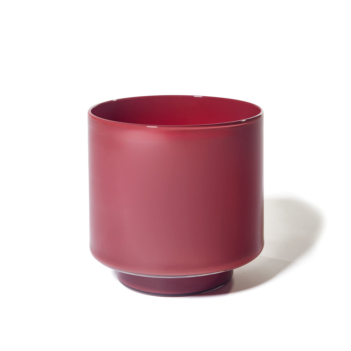 A cylindrical Fiorelli Low Container in sienna with a matte finish and a slightly raised base, set against a white background.