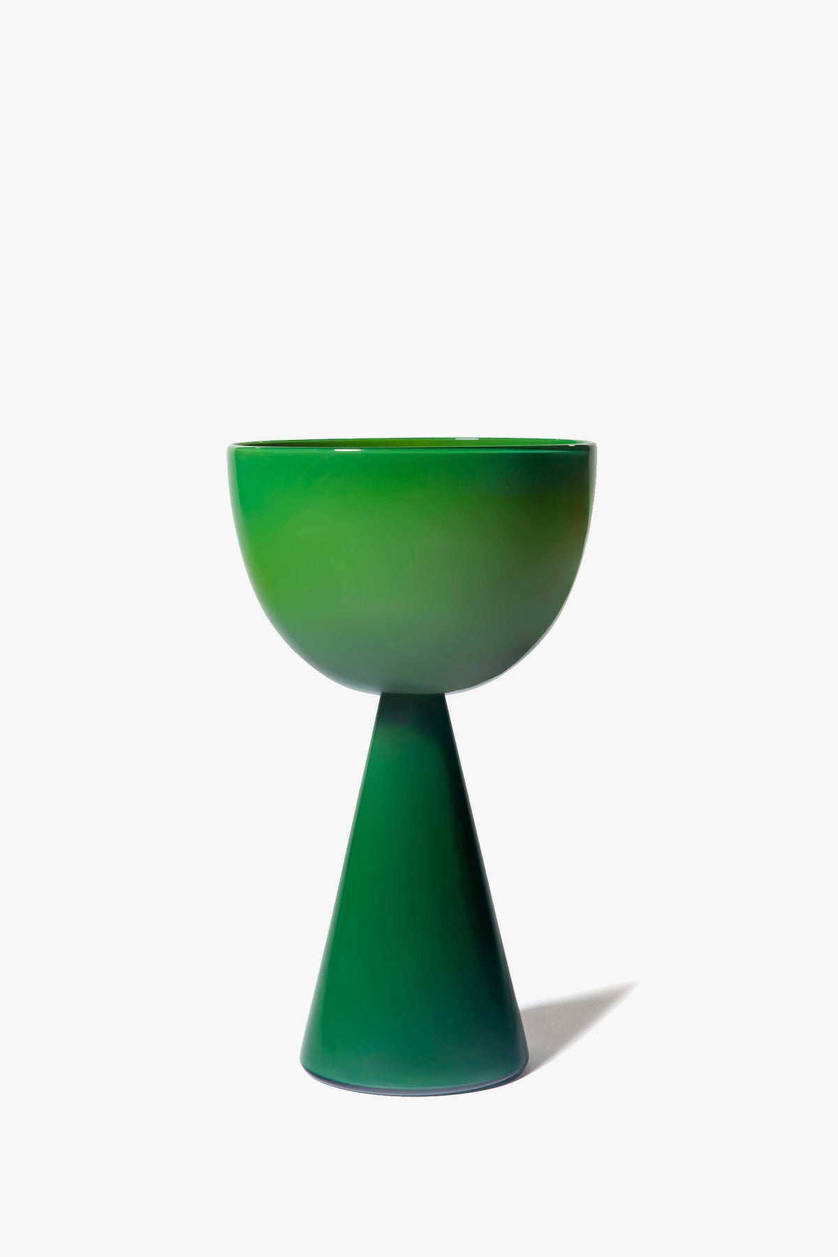 The Fiorelli Low Bowl is a modern, glossy green ceramic cup featuring a bowl-shaped top and a cone-shaped base, set against a plain white background.