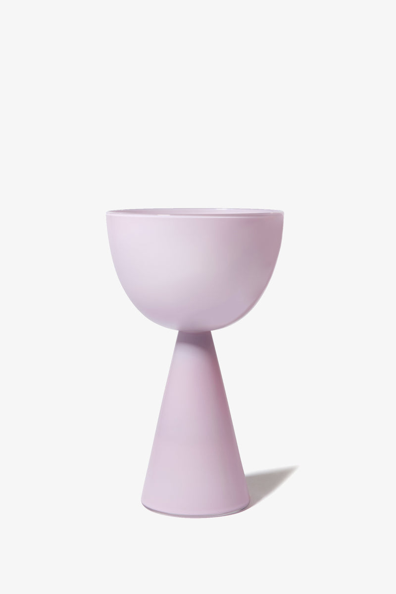 The Fiorelli Low Bowl is a modern planter in light purple, featuring a bowl-shaped top and a cone-shaped base, displayed against a plain white background.