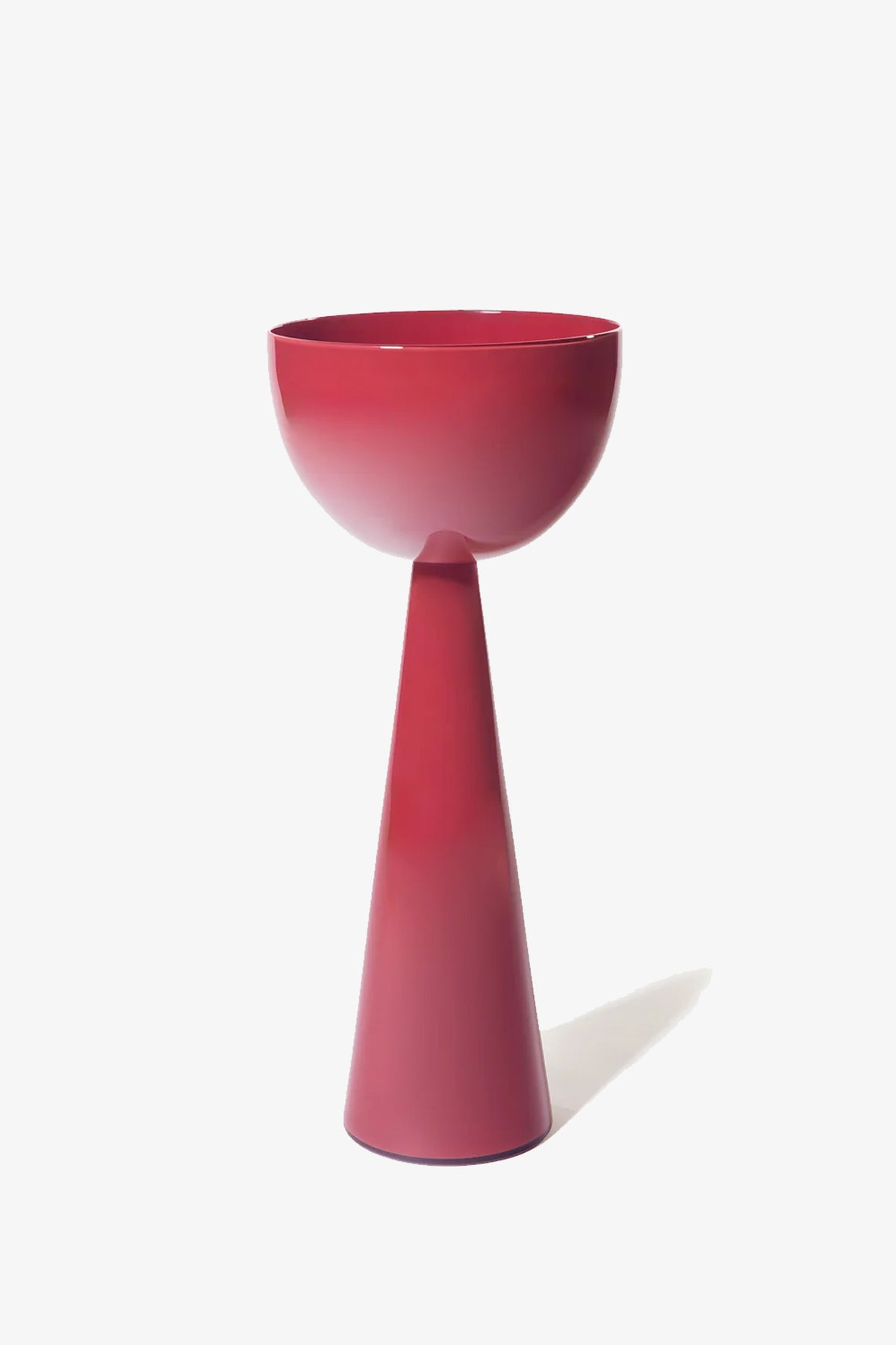 The Fiorelli Tall Bowl, featuring a modern glossy red finish and a wide rim, sits atop its tall, cone-shaped base against a plain white background.