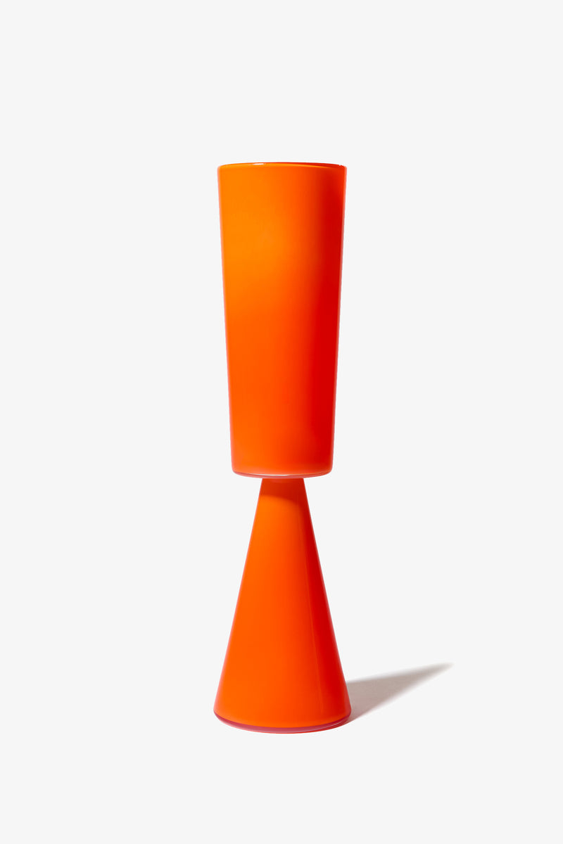 A vibrant orange Fiorelli Tall Cylinder with a modern hourglass shape and a narrow middle, displayed against a plain white background.
