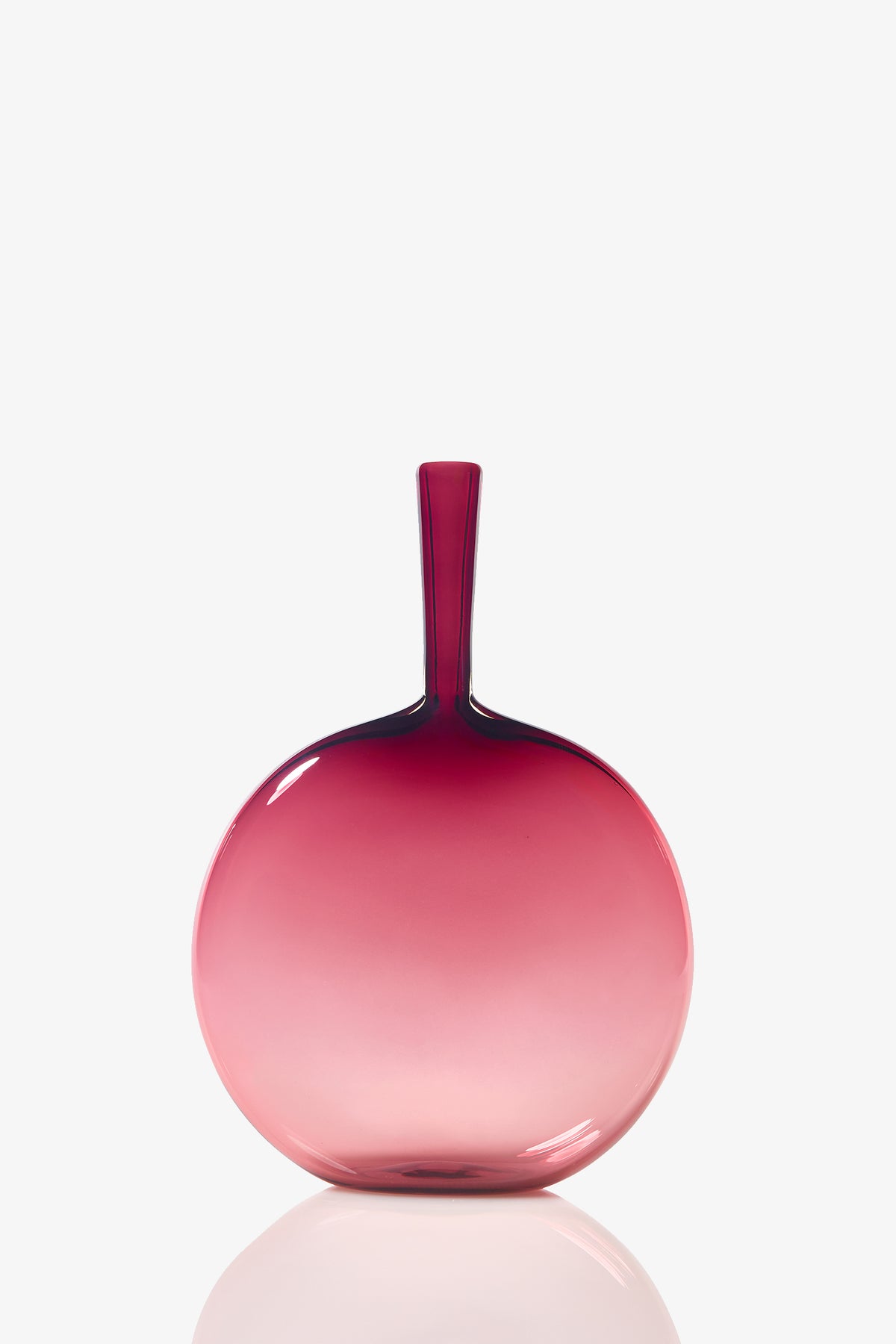 The Flask Angelic Bottle is a round glass vase with a narrow neck, showcasing a smooth gradient from deep pink at the top to light pink at the base, set against a white background.