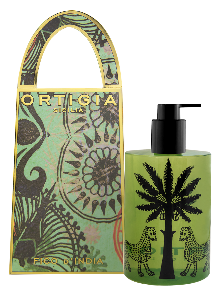 A green Ortigia Fico D’India Hand Soap bottle with a black pump and palm tree and leopard designs stands next to its decorative box, which features botanical patterns and gold trim.