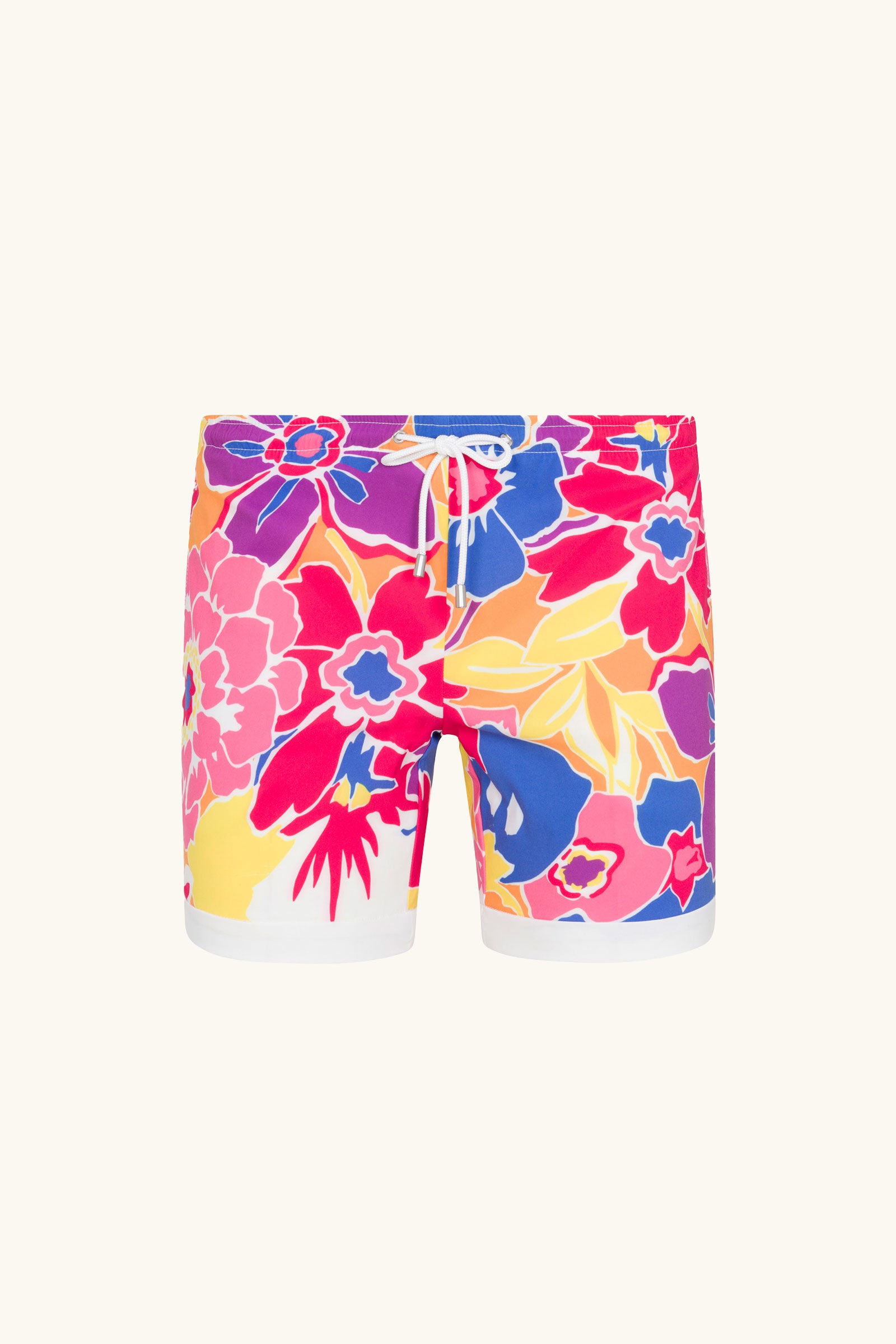 The Hermosa Beach Board Short - Soie Paradis features a bold floral print in pink, red, yellow, orange, and purple with a white waistband, drawstring tie, and white trim at the hem.