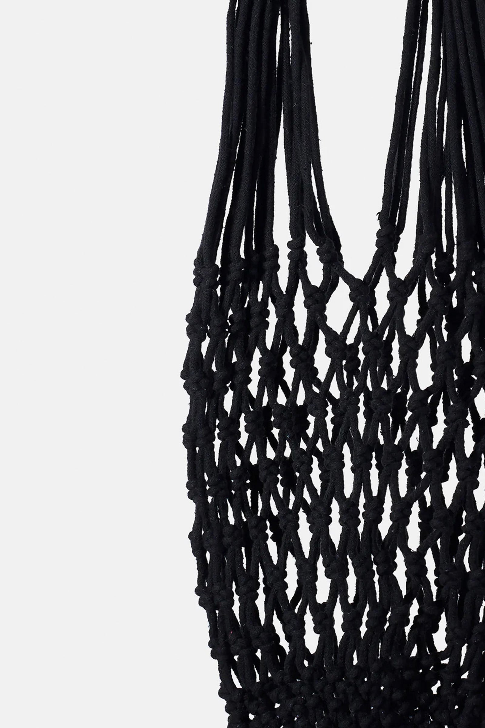 Of course! Please provide the keywords you'd like me to use for the NANNACAY KIM WOVEN BAG.