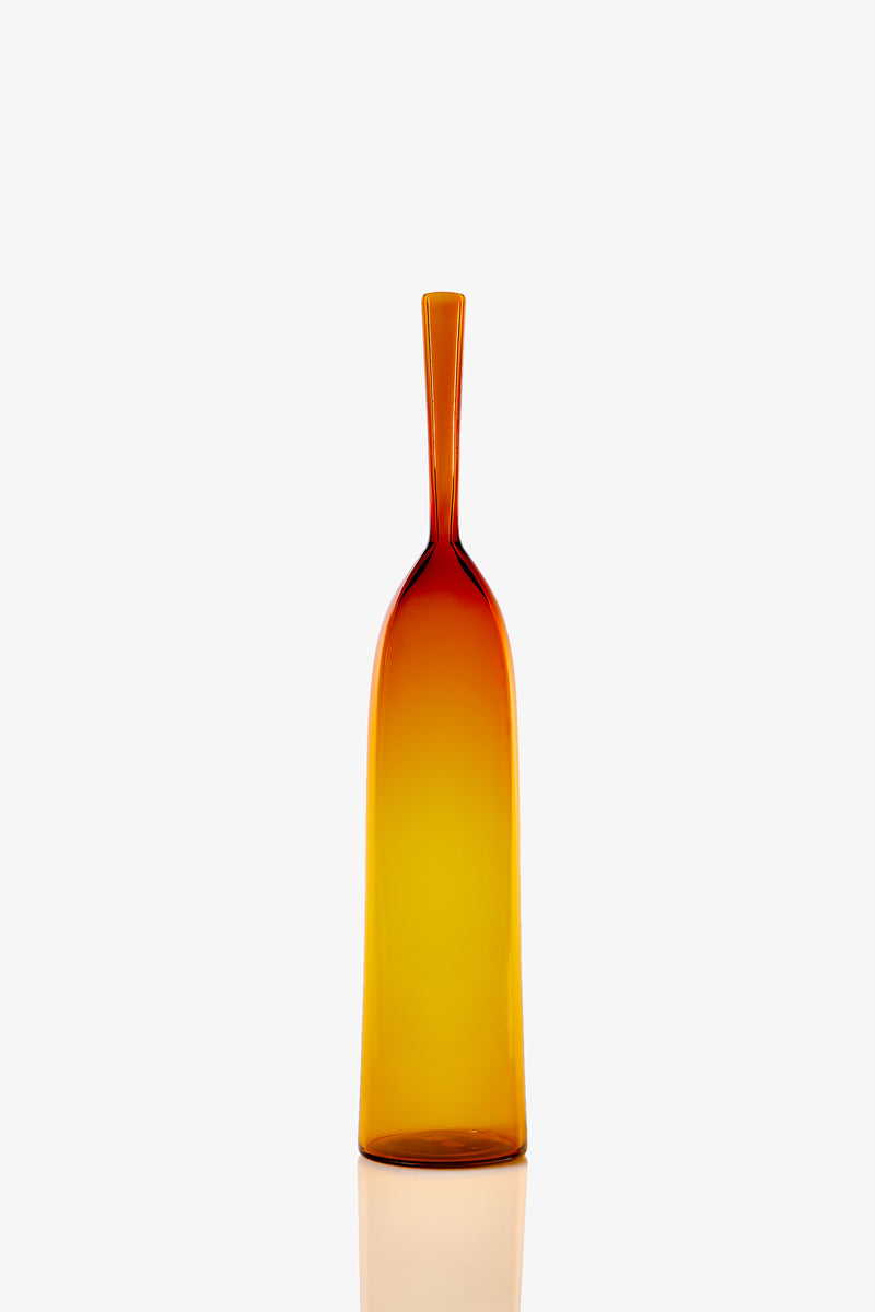 The Large Angelic Bottle is a tall, slender glass bottle with a narrow neck and a smooth gradient from deep amber at the top to yellow at the bottom, displayed against a plain white background.