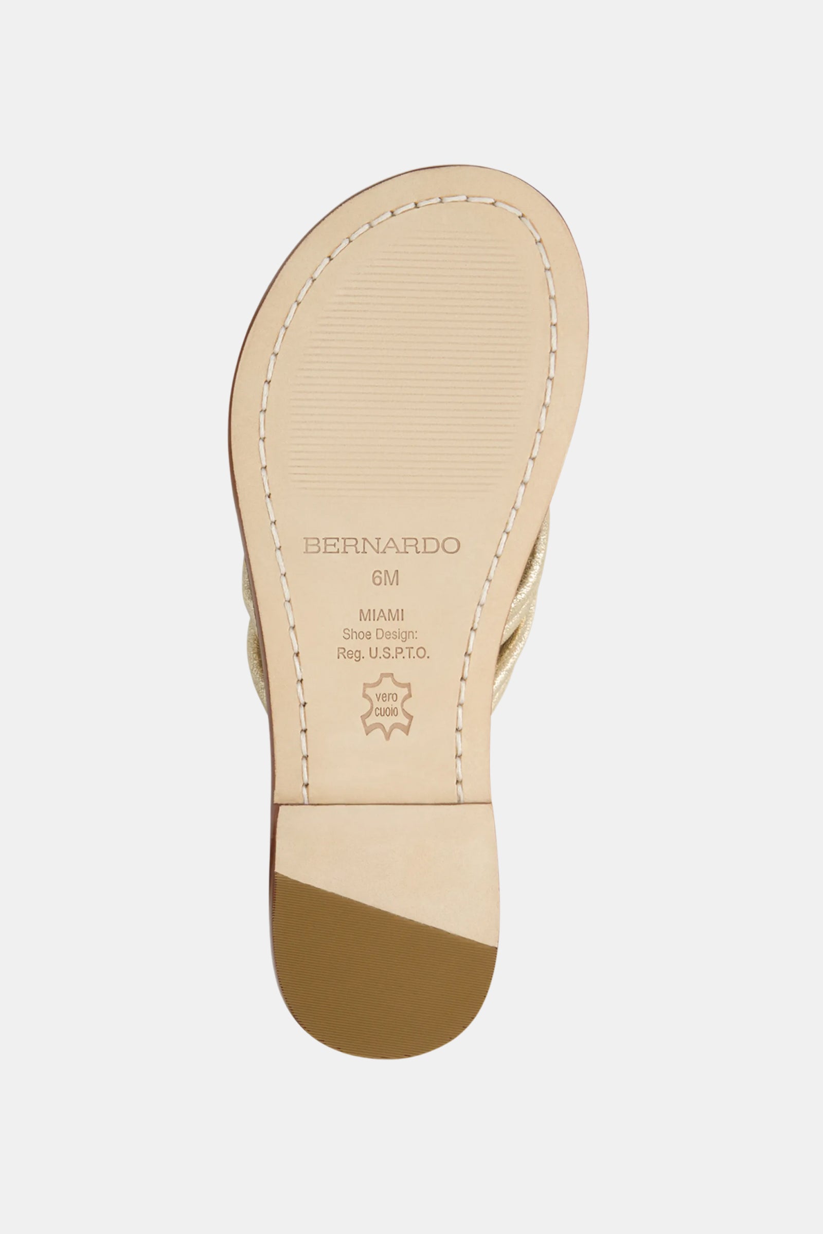 The image shows the sole of a beige Miami Sandal by Bernardo, size 6M, featuring “Miami Shoe Design,” a darker heel section, and visible stitching around the edge.