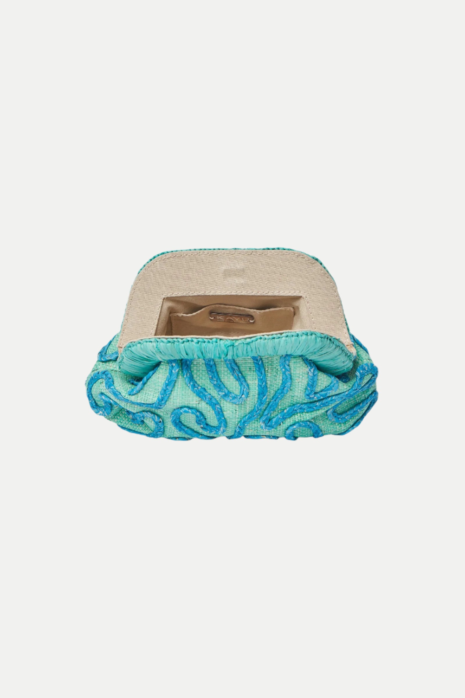 The Neomi Turquoise Raffia Embroidered Clutch features turquoise and blue woven details, a beige interior, and an open frame, shown from above on a white background.