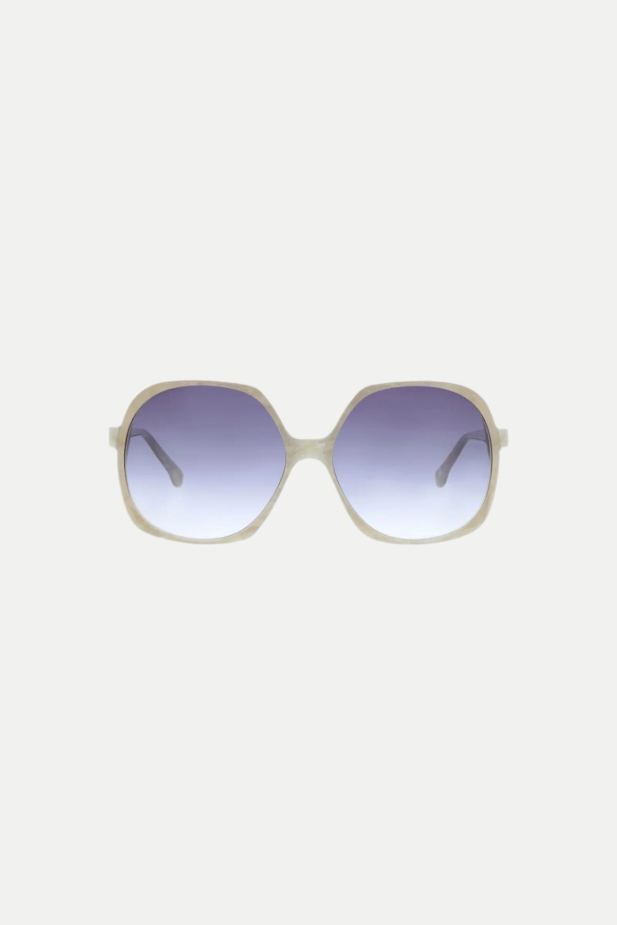 The Paradis Oversized Square Acetate Sunglasses in Pearl feature a light-colored frame and dark gradient lenses, showcased against a plain white background.
