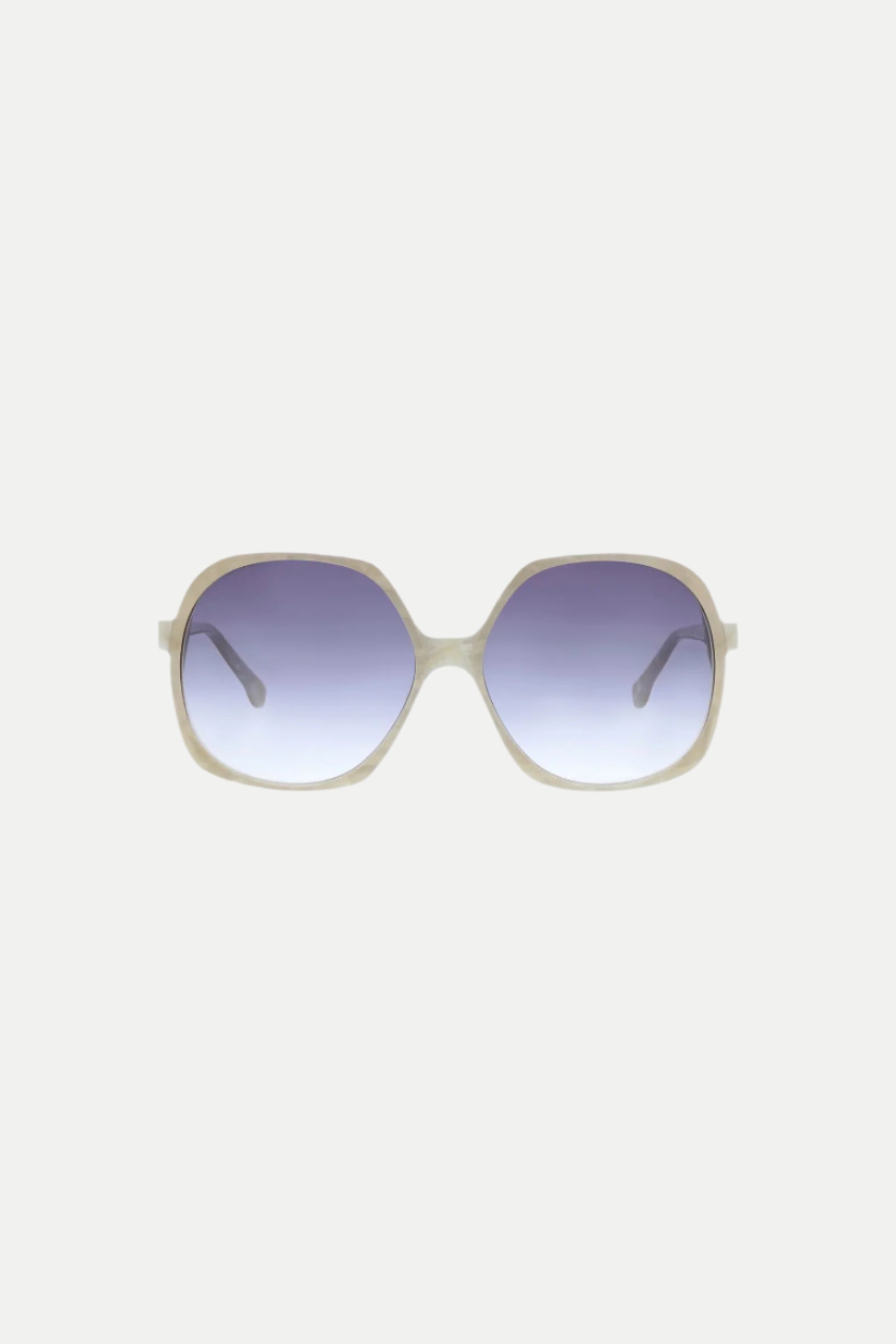 The Paradis Oversized Square Acetate Sunglasses in Pearl feature a light-colored frame and dark gradient lenses, showcased against a plain white background.