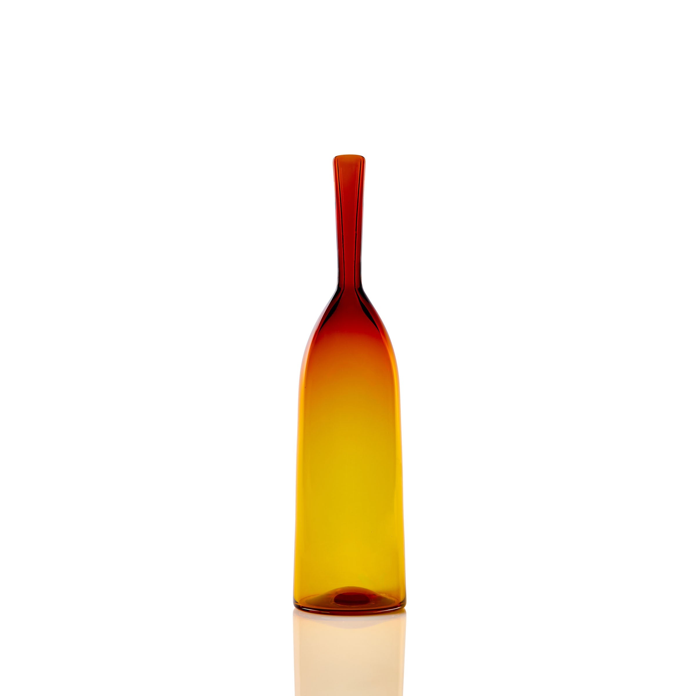 The Small Angelic Bottle is a slender glass piece with an elegant silhouette and narrow neck, featuring an amber hue. Set against a white background, it makes a striking addition to any collection.