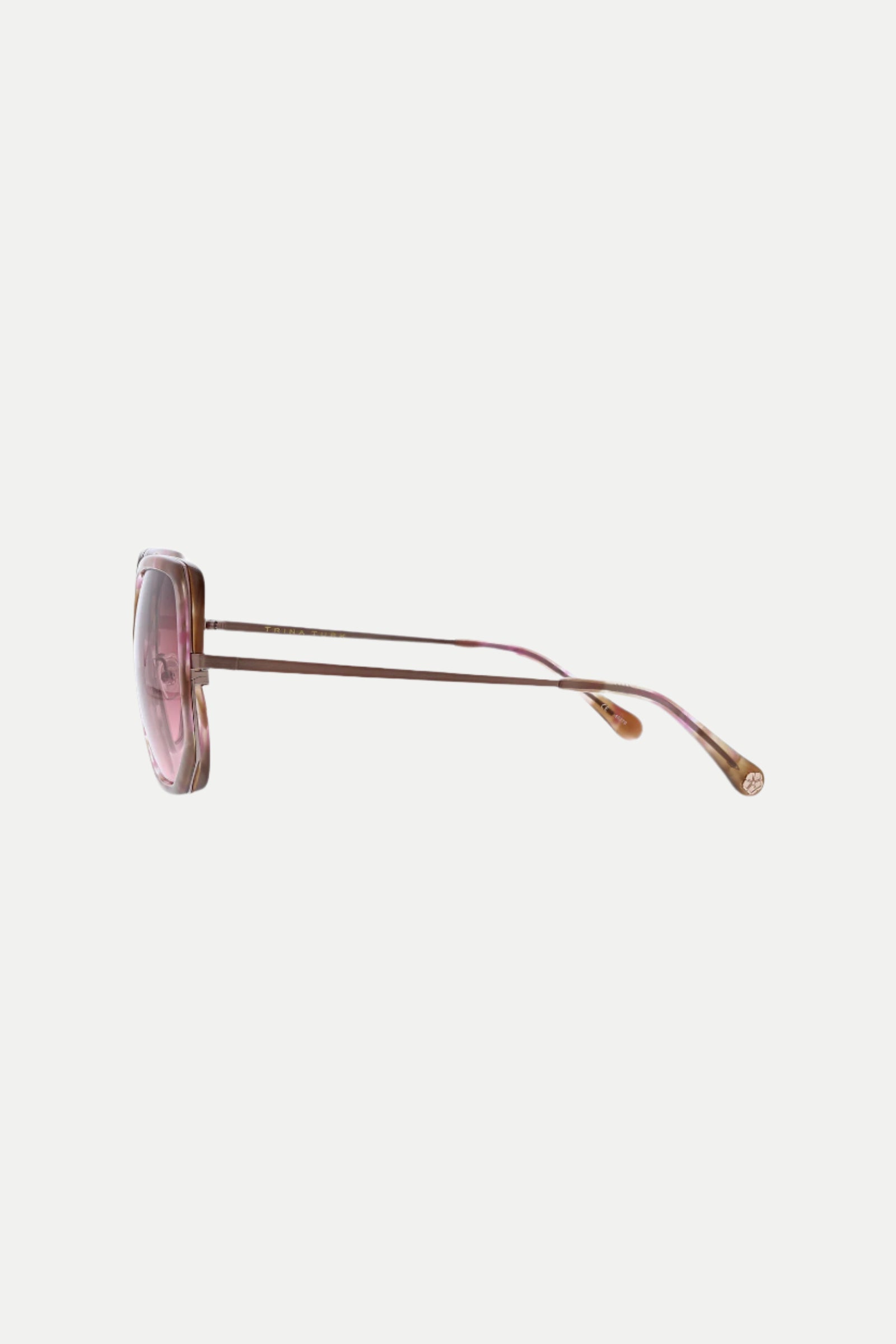 Side view of Seraphine Oversized Square Sunglasses with pink lenses, thin gold metal arms, and pink temple tips against a white background.