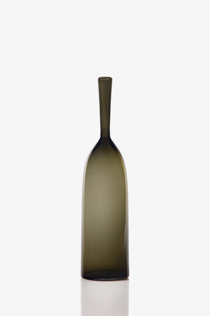 The Small Angelic Bottle is a tall, slender olive-green glass bottle with a narrow neck and smooth, rounded sides, shown standing upright on a plain white background.