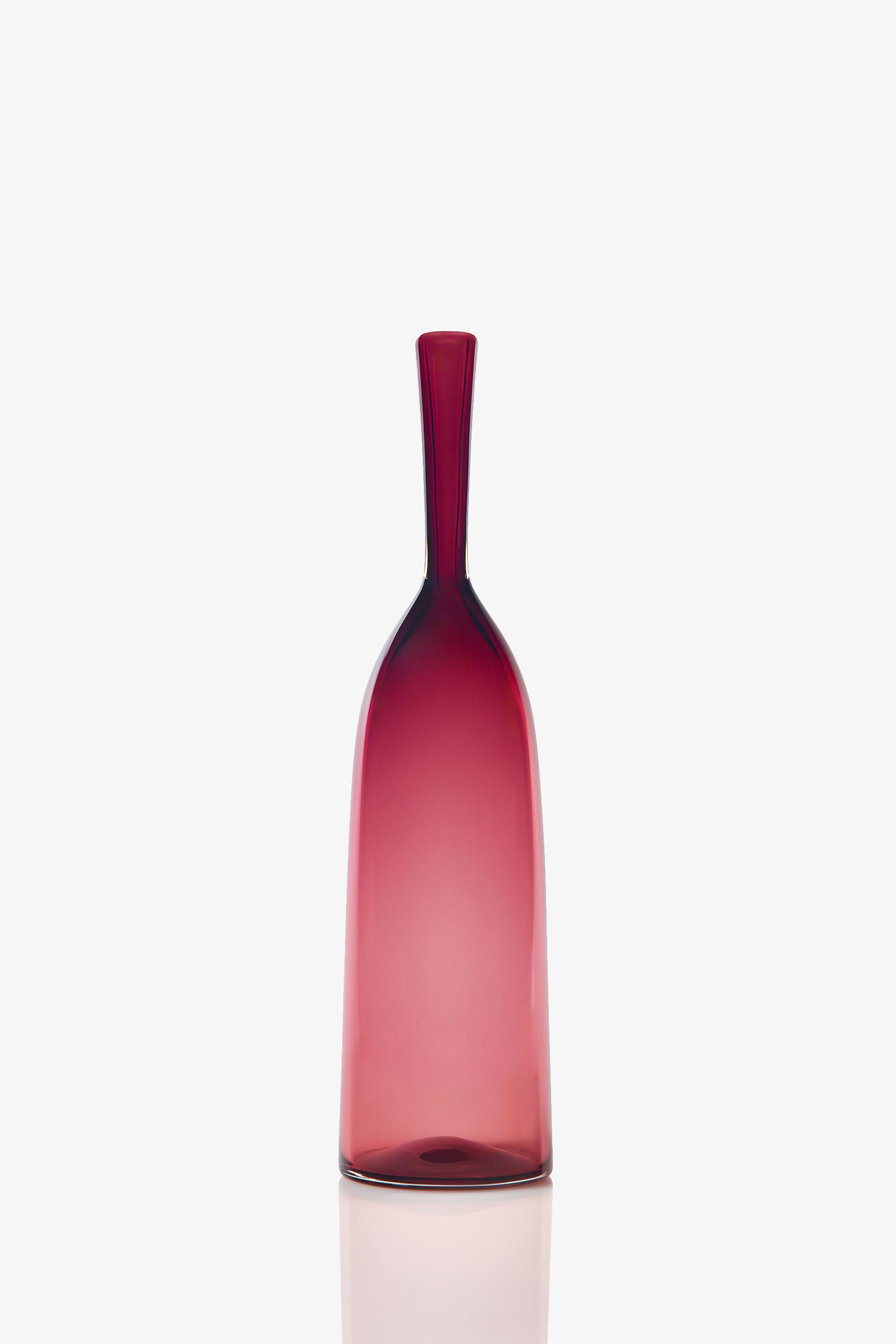 The Small Angelic Bottle is a minimalist, tall translucent glass bottle with a narrow neck and a deep red gradient, displayed on a plain white background.