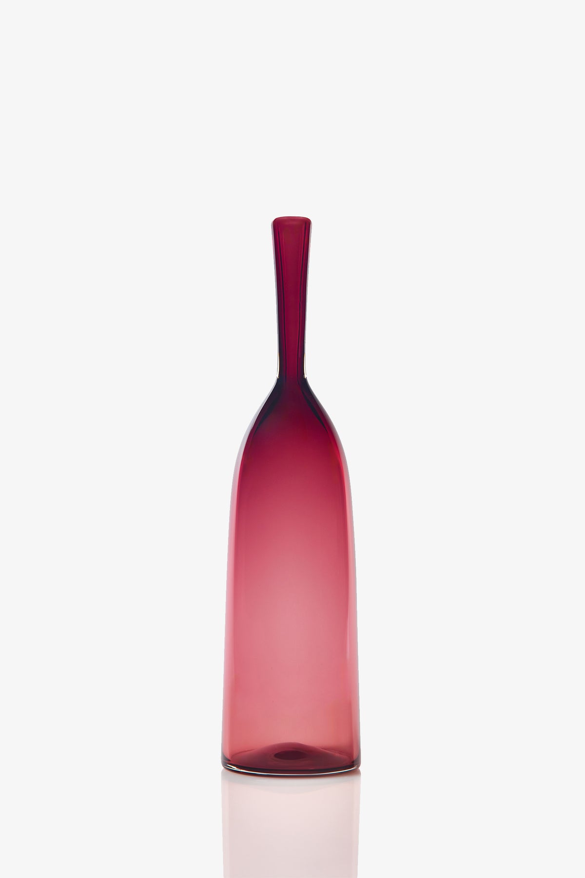 The Small Angelic Bottle is a minimalist, tall translucent glass bottle with a narrow neck and a deep red gradient, displayed on a plain white background.