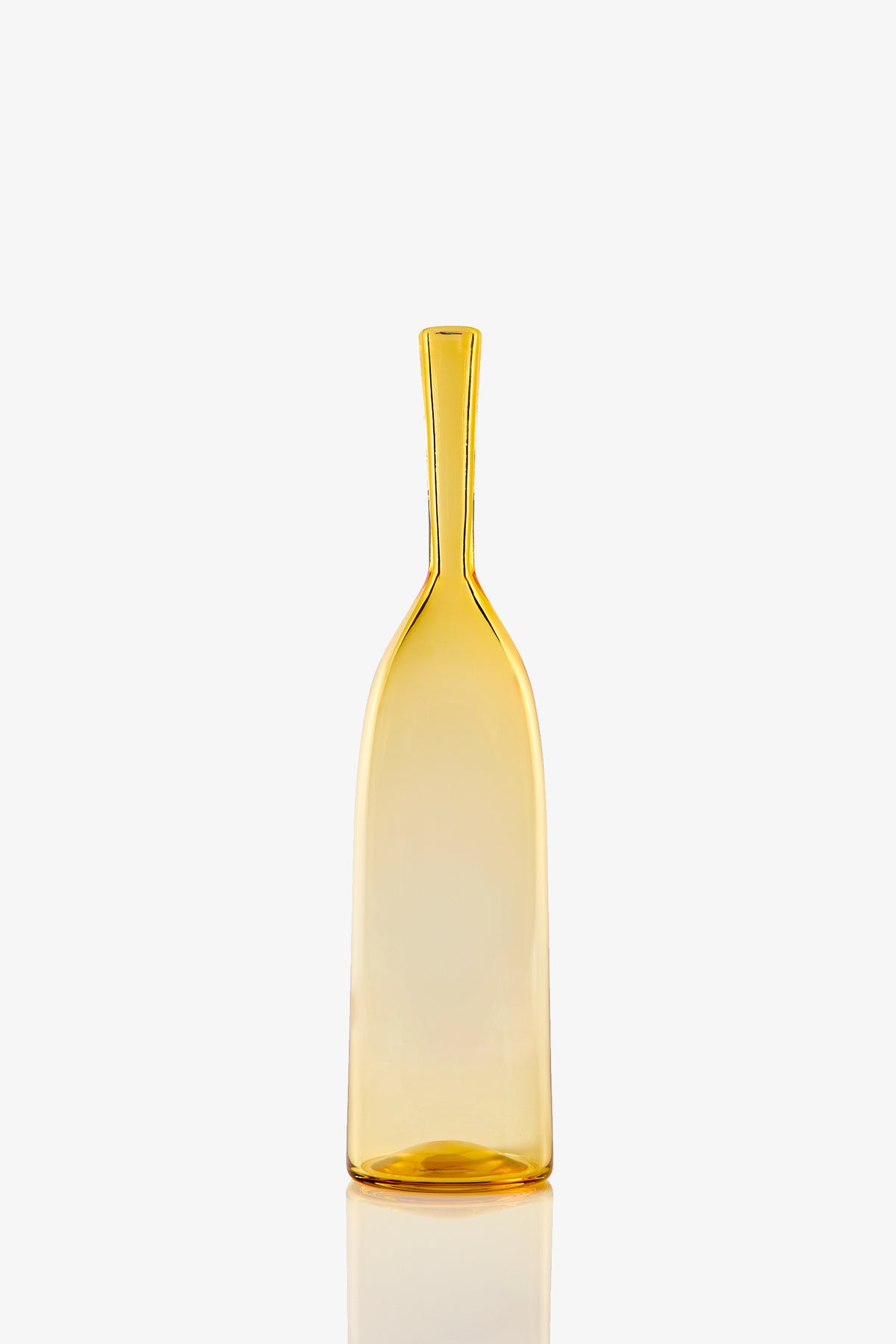 The Small Angelic Bottle is a tall, slender, translucent amber glass bottle with a narrow neck and slightly flared base, shown upright on a white background.