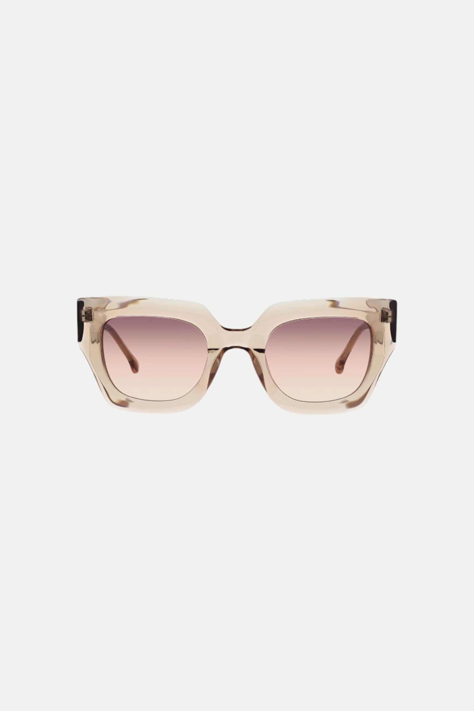 The Sol Wide Frame Square Acetate Sunglasses in Sand feature thick, translucent rectangular frames and light pink gradient lenses, shown against a plain white background.