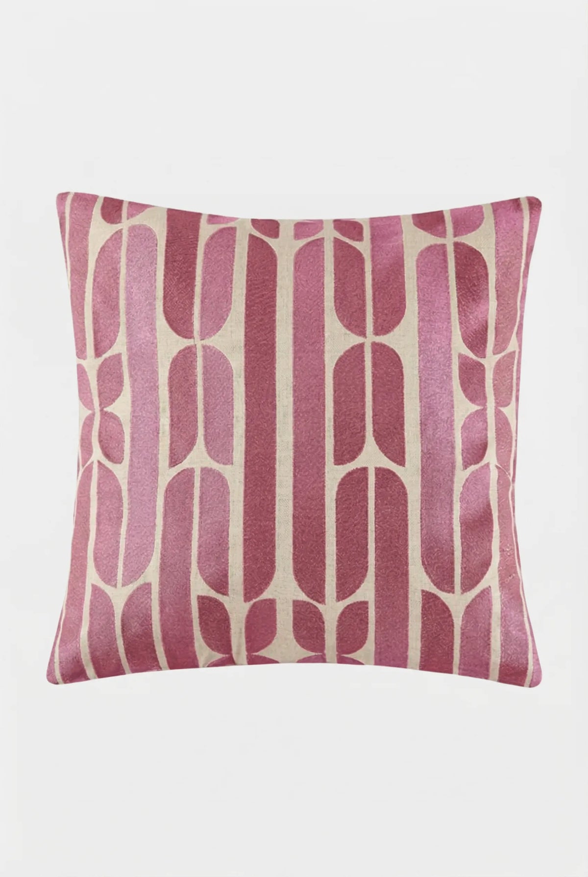 The Palmdale Emb Pillow 20X20" features a modern geometric stripe pattern in pink and beige, showcasing vertical and curved shapes on smooth fabric with a plain white background.
