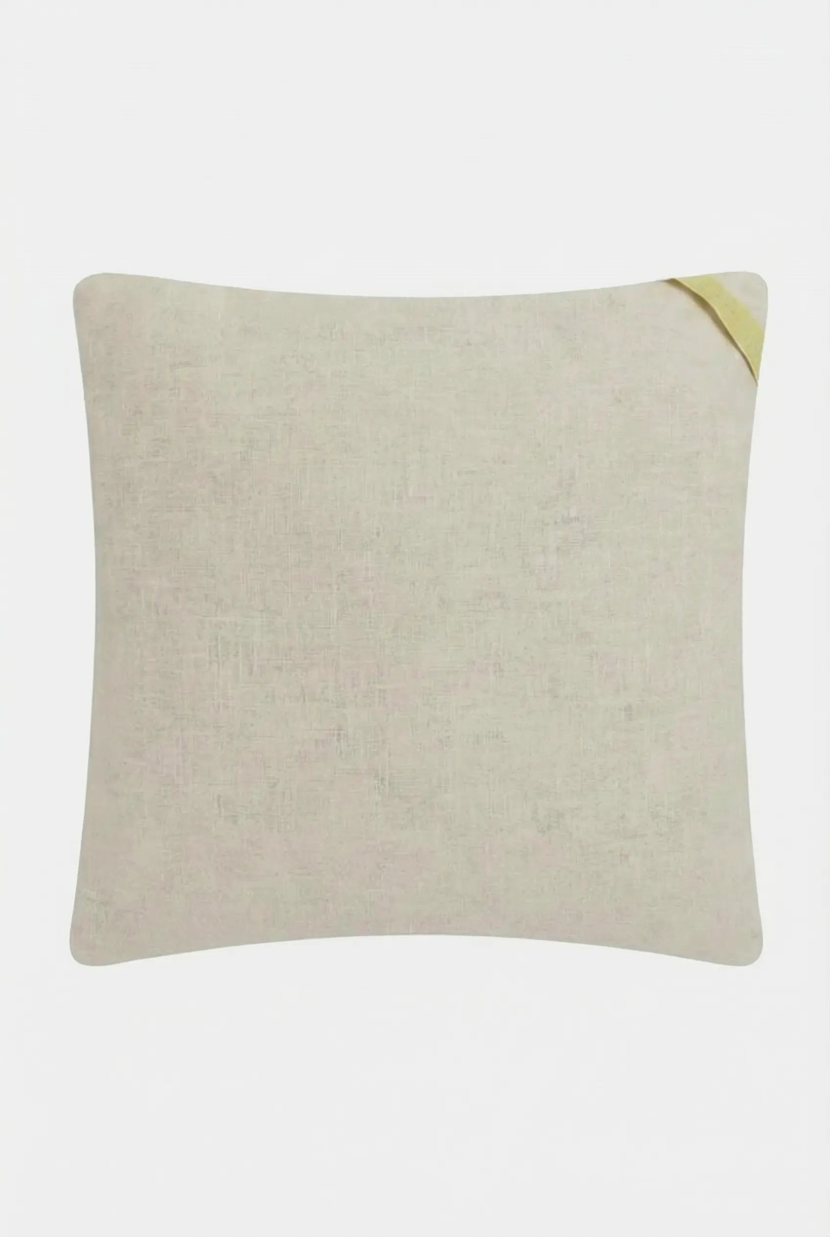 The Pasadena Embroidered Throw Pillow is a square, light beige cushion with subtle textured fabric and a small yellow fabric loop on the top right corner, shown against a plain white background.