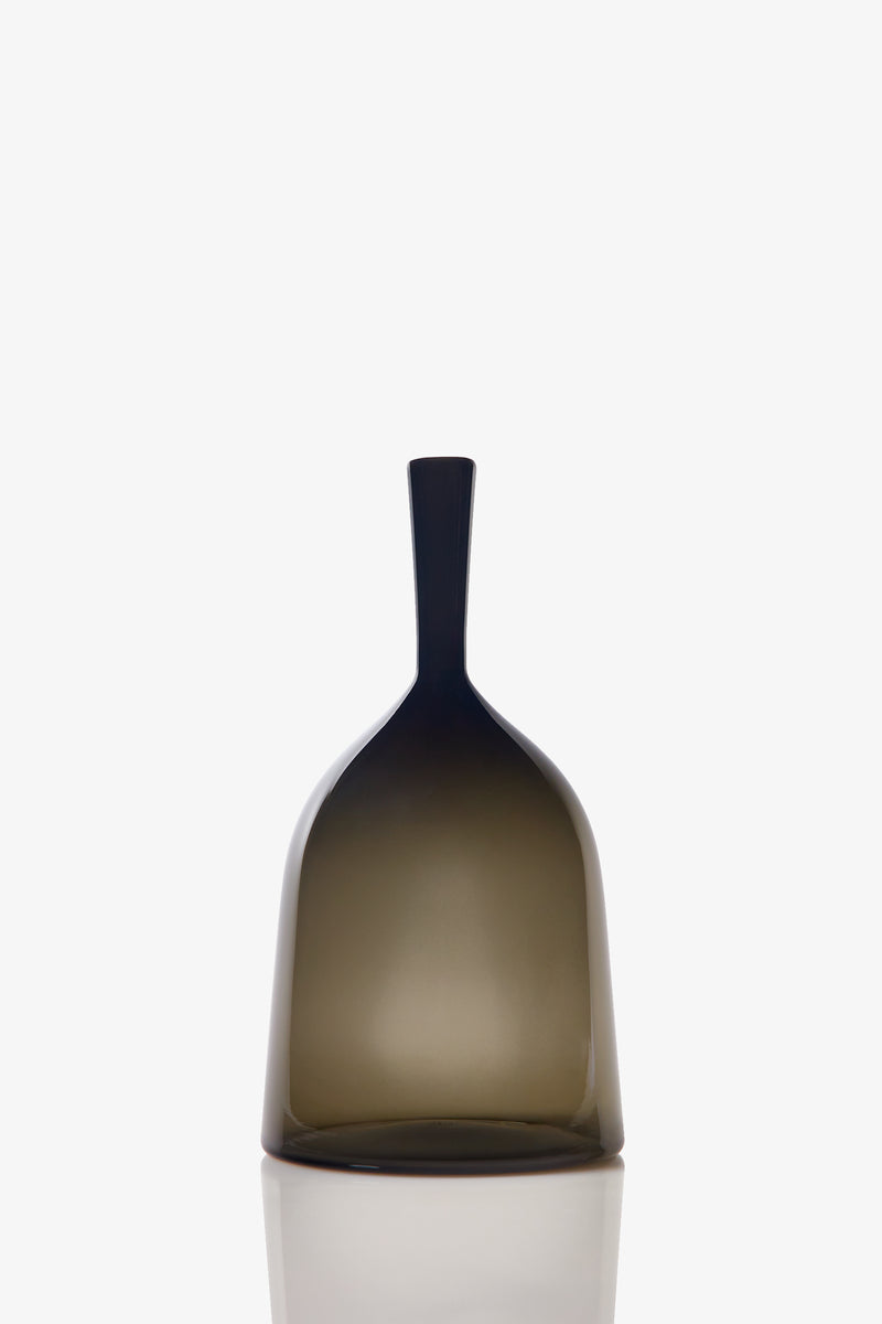 The Wide Angelic Bottle is a modern vase made of translucent brown glass featuring a rounded body and tall, narrow neck, set against a plain white background.