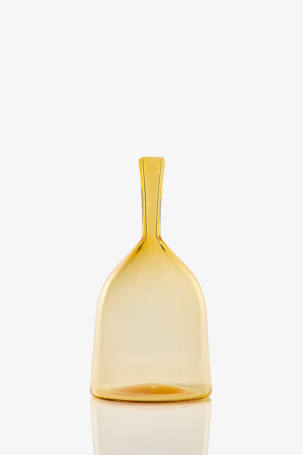 The Wide Angelic Bottle is a translucent yellow glass bottle with a wide base and a tall, narrow neck, shown against a plain white background.