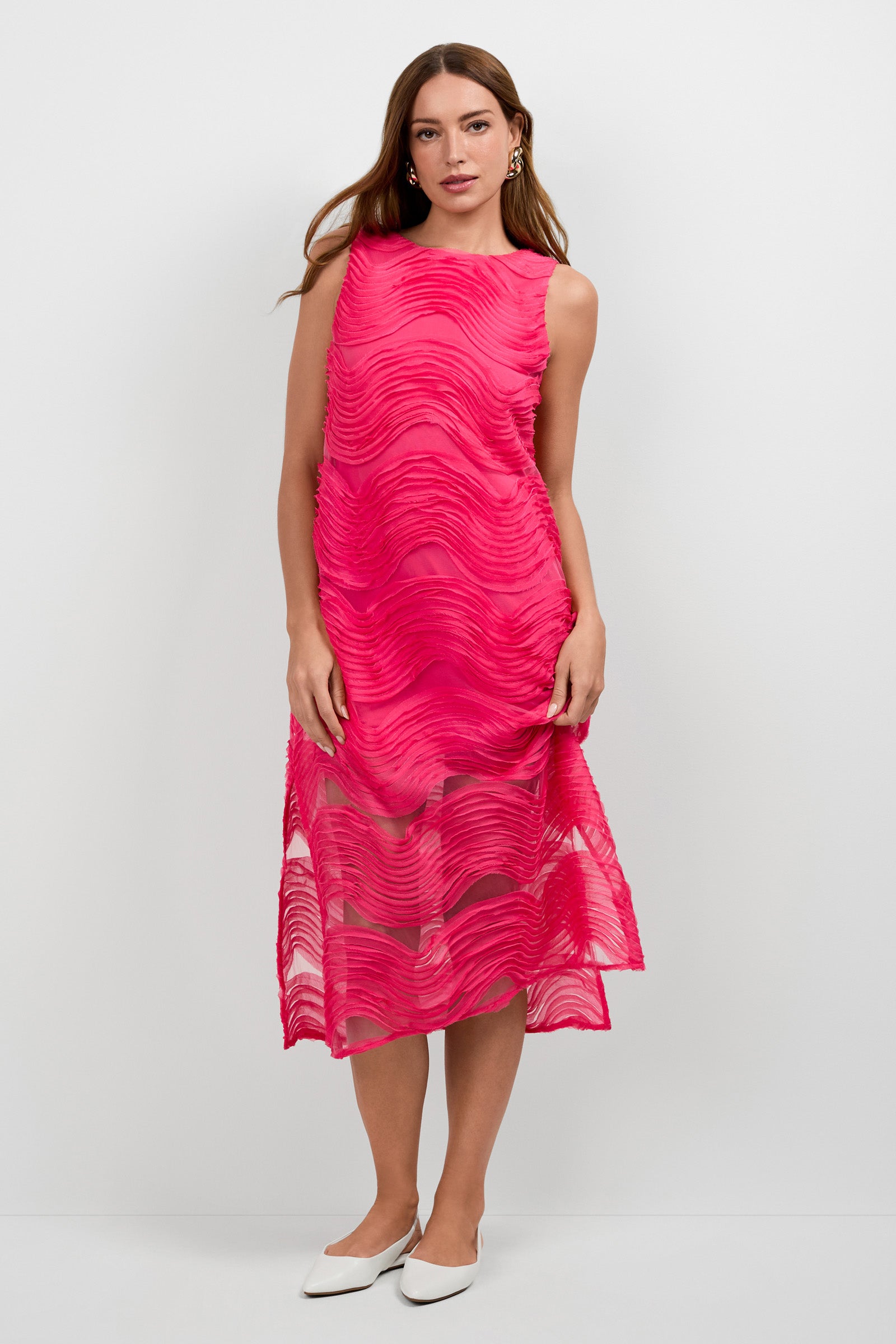 A woman wearing the Belisama Organza Midi Dress.