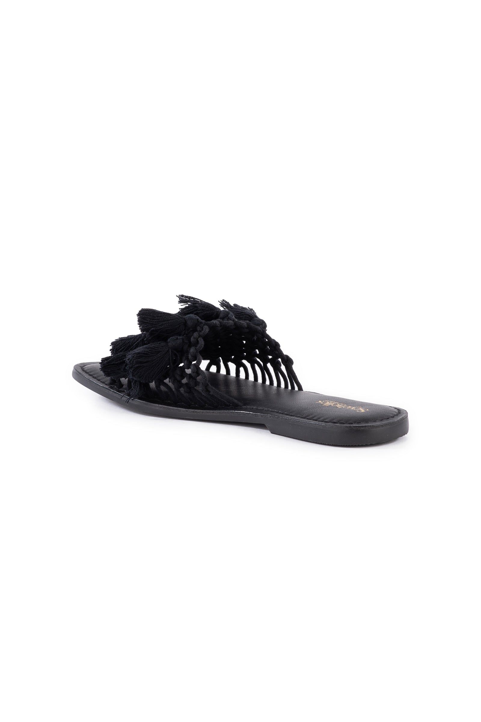 The Seychelles Camellia Slide Sandal features a black, fringed handwoven macrame upper, cushioned footbed, and open toe, shown angled on a white background.