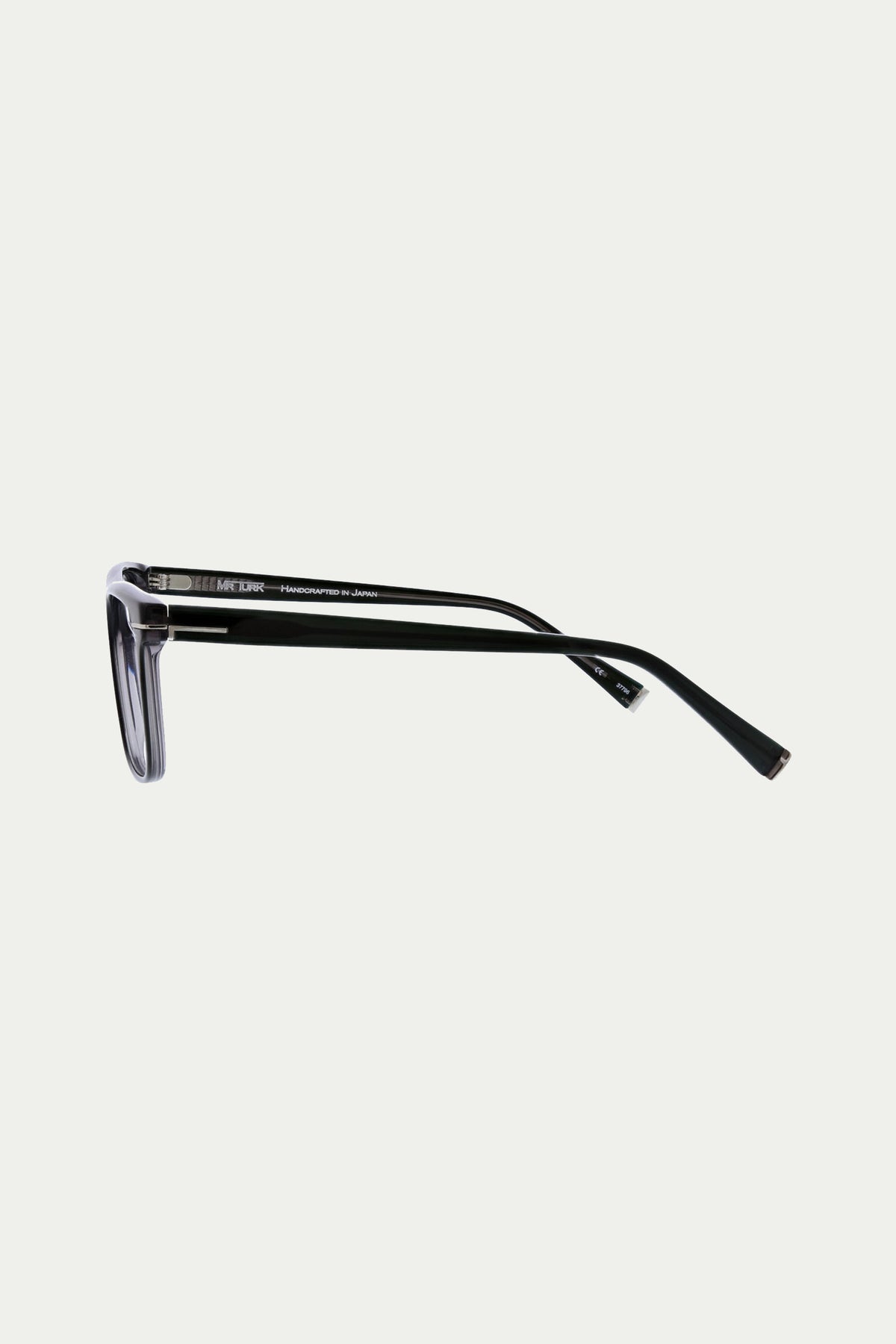 Side view of Jacobsen Optical Eyewear featuring a black metal frame, thin straight arms, and rectangular lenses, set against a plain white background.