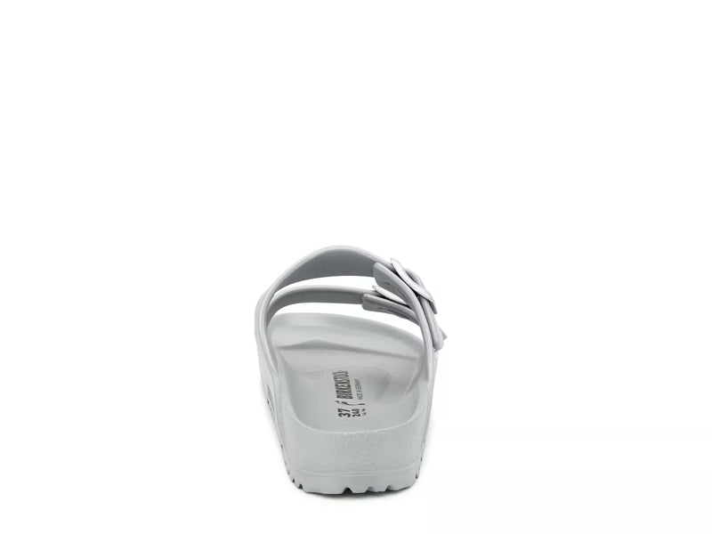 The Birkenstock Arizona Eva Sandal is shown from the back on a plain white background, featuring a single wide strap, a decorative bow on the right side, textured sole, and visible size markings inside.