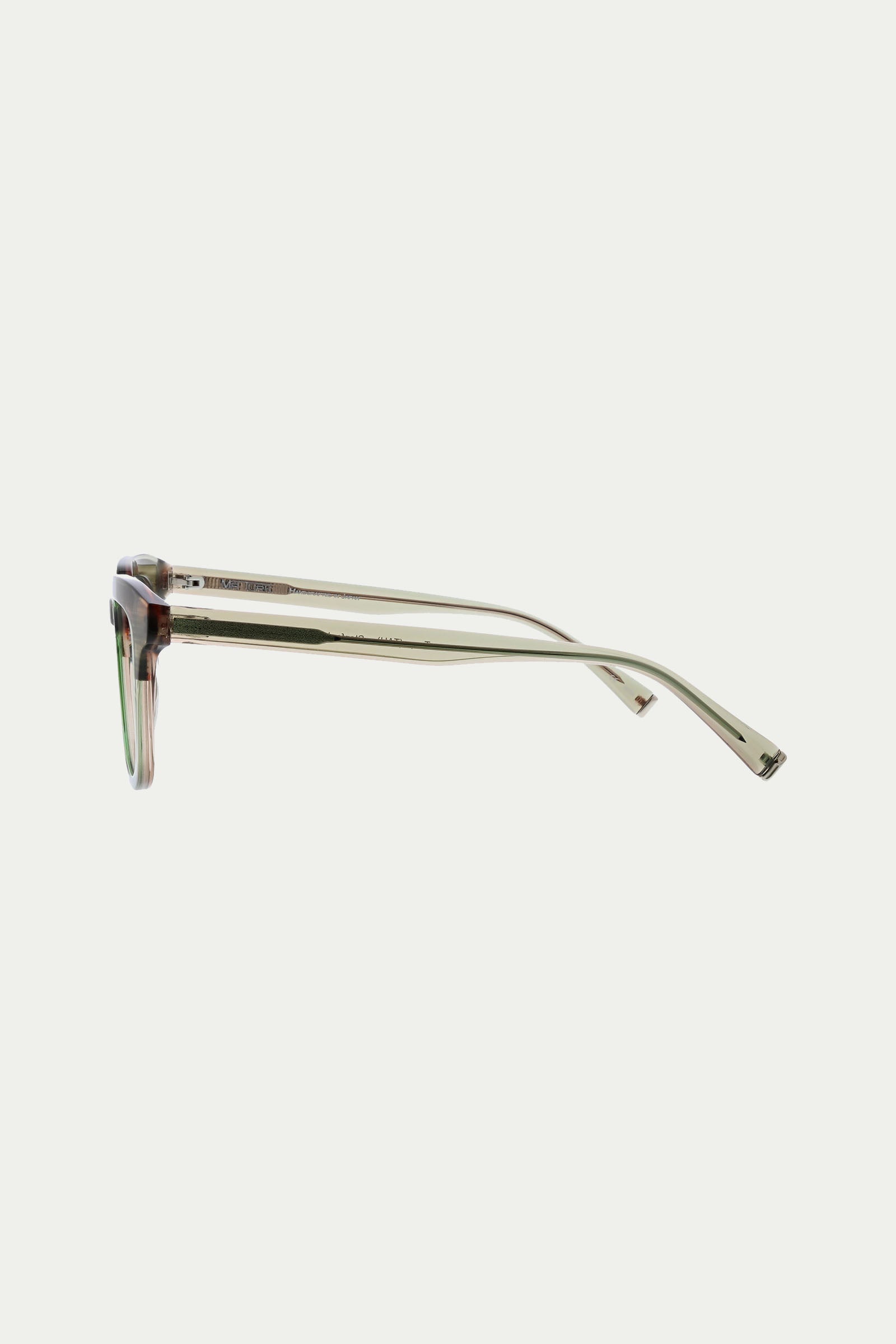 Side view of the Stanford Eyeglass, featuring transparent, light-colored frames and thin arms, displayed against a plain white background.