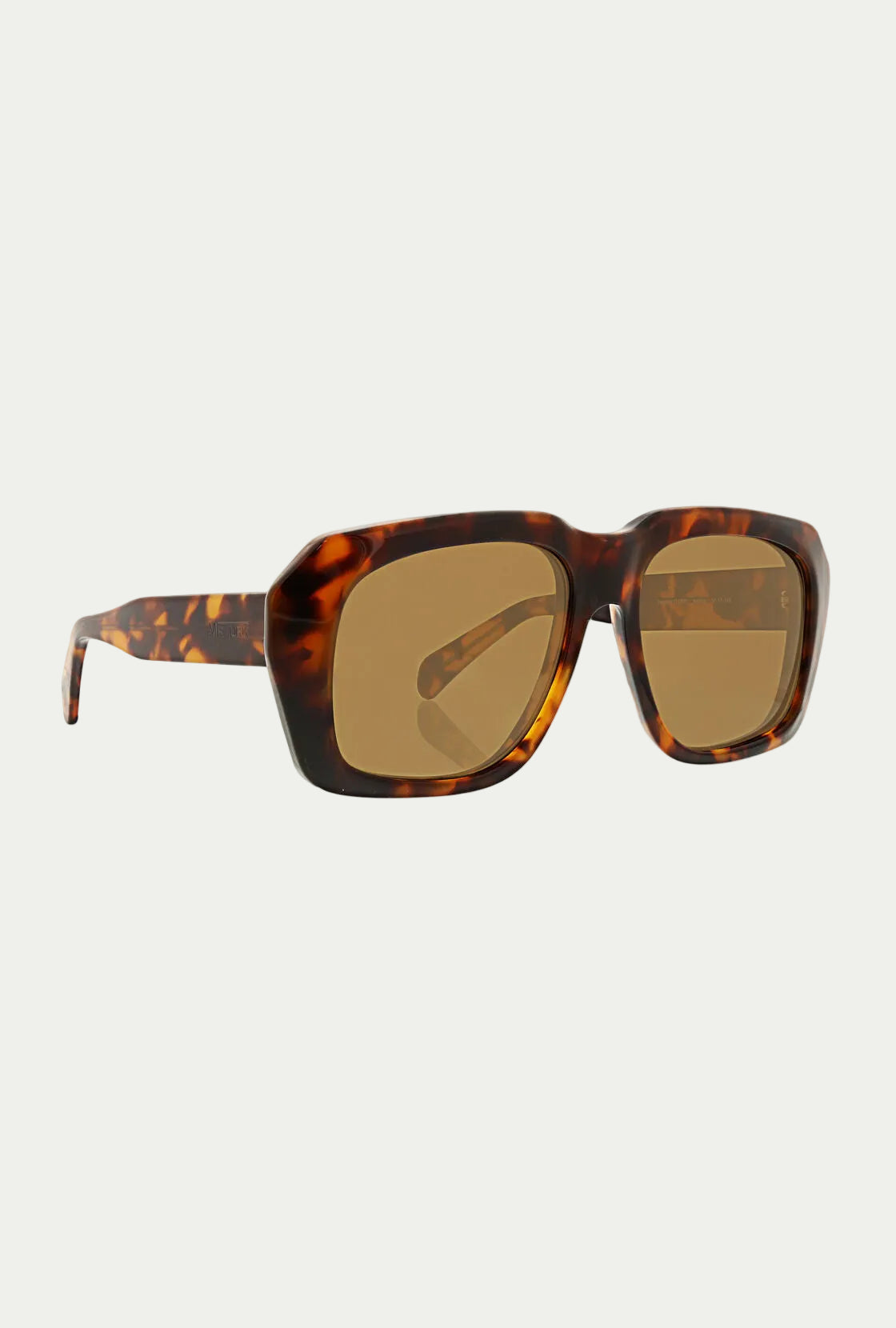 The Andros Sunglass features a bold tortoiseshell acetate frame and rectangular brown-tinted lenses, offering 100% UVA/UVB protection. Displayed on a white background.
