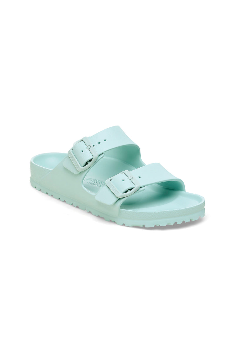 The Mens Arizona Green Eva Slide Sandal features a green color, two adjustable buckled straps, a textured footbed, and ridged sole. This lightweight EVA sandal delivers comfort and style for everyday wear.