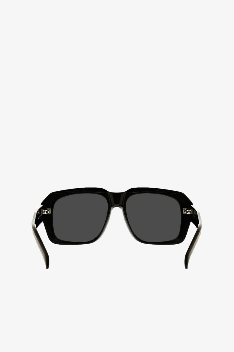 Andros Sunglass, a pair of black rectangular sunglasses featuring thick frames and dark lenses, displayed from the front against a plain white background.