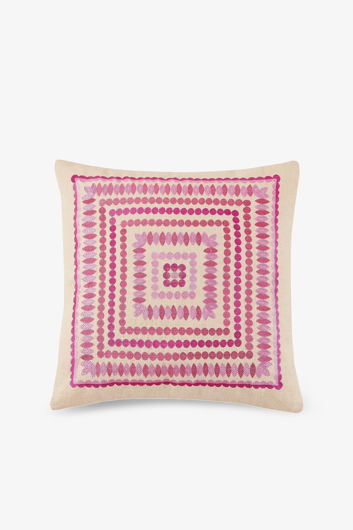 Carmel Embroidered Square Pillow with a beige background, showcasing pink and purple geometric dots and ovals in concentric square patterns.