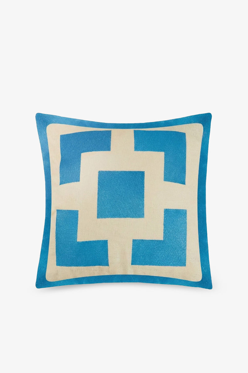 Experience modern style with the Palm Springs Block Embroidered Square Pillow, a 20″x20″ accent featuring a bold geometric pattern in blue and beige. Inspired by TRINA TURK HOME collections, its design showcases interlocking rectangles and squares embroidered on a crisp white background. Choose the optional down feather insert for added plush comfort.