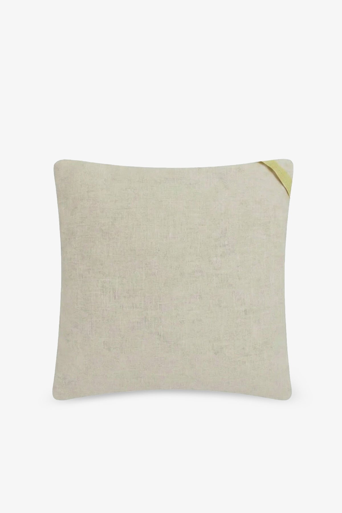 The Palm Springs Block Embroidered Square Pillow is a rectangular beige pillow with a subtle texture, featuring a small light green fabric corner accent on the top right against a plain white background. This 20″x20″ TRINA TURK HOME pillow cover comes with a plush down feather insert for added comfort and style.