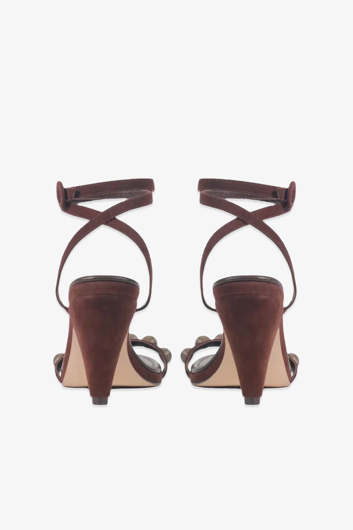 A pair of Paula Torres Espanha Sandal heeled sandals in brown, seen from the back, showcasing crisscross ankle straps and a cushioned insole on sturdy block heels.