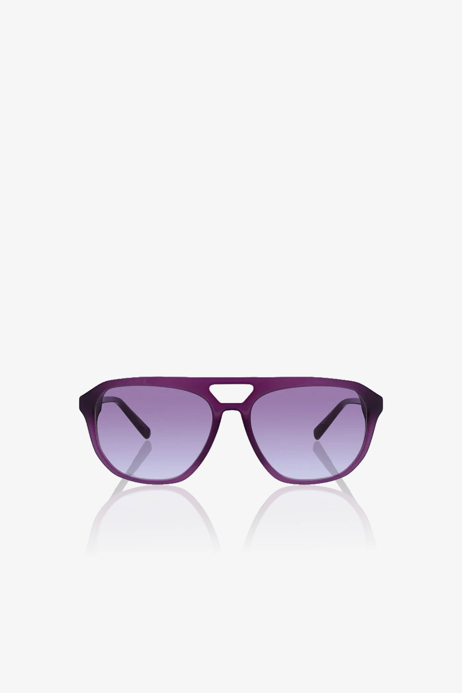Introducing the Lawson Sunglass: purple aviator-style sunglasses crafted from vibrant purple acetate, featuring a double bridge and gradient lenses. Displayed on a white background with a subtle reflection below, these sunglasses provide reliable UVA/UVB protection for both stylish and safe wear.
