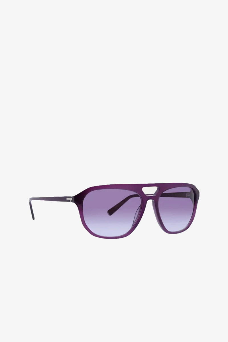 The Lawson Sunglass is showcased on a plain white background, featuring aviator-style frames crafted from sleek purple acetate and gradient purple-tinted lenses. Combining a modern, minimalistic design with dependable UVA/UVB protection, these sunglasses blend style and functionality.