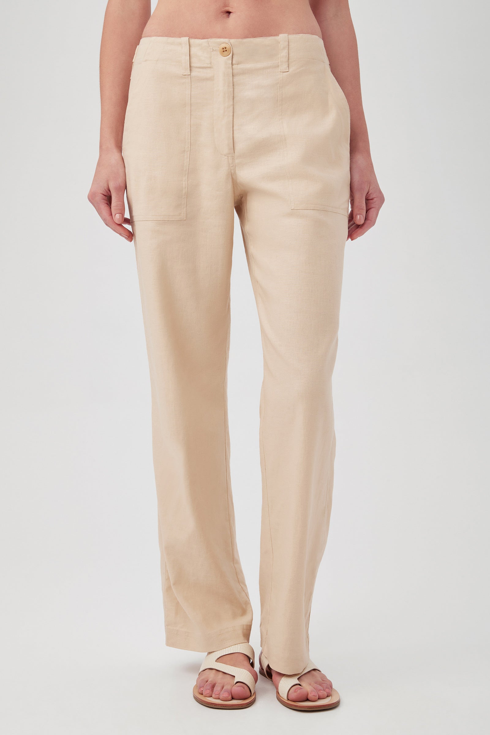 A pair of beige Antonia pants by Trina Turk, featuring a straight leg cut and a mid-rise waist.