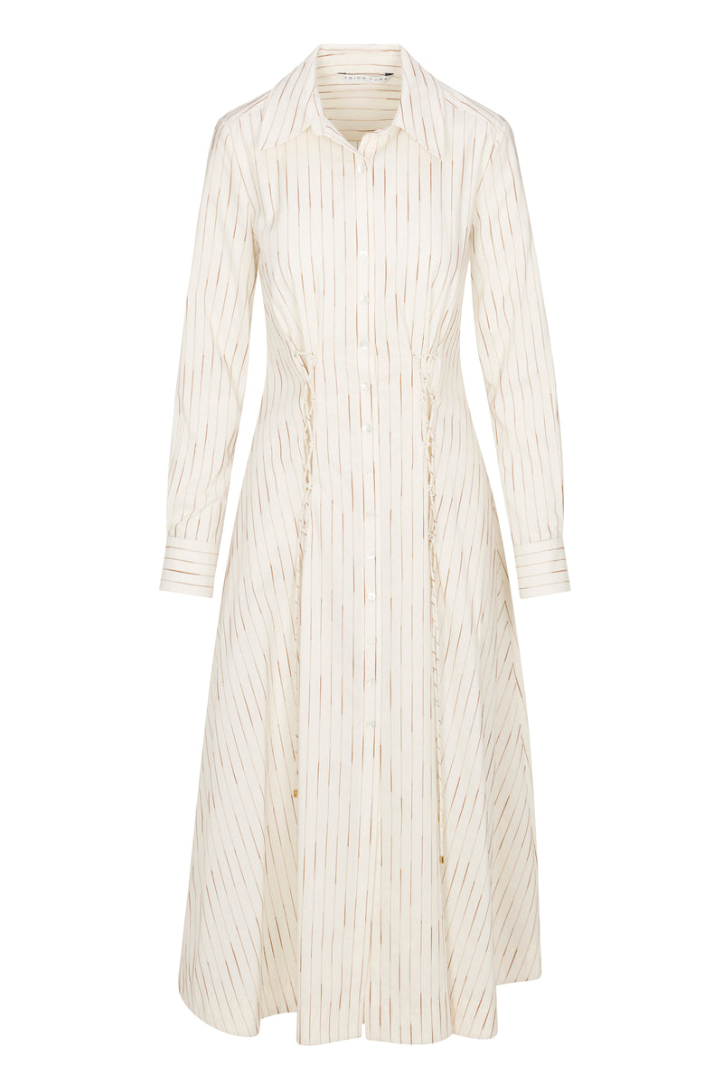 The Omari Dress is a cream, knee-length, long-sleeve shirt dress with thin vertical brown stripes, a collared neckline, button-down front, and slightly fitted waist.