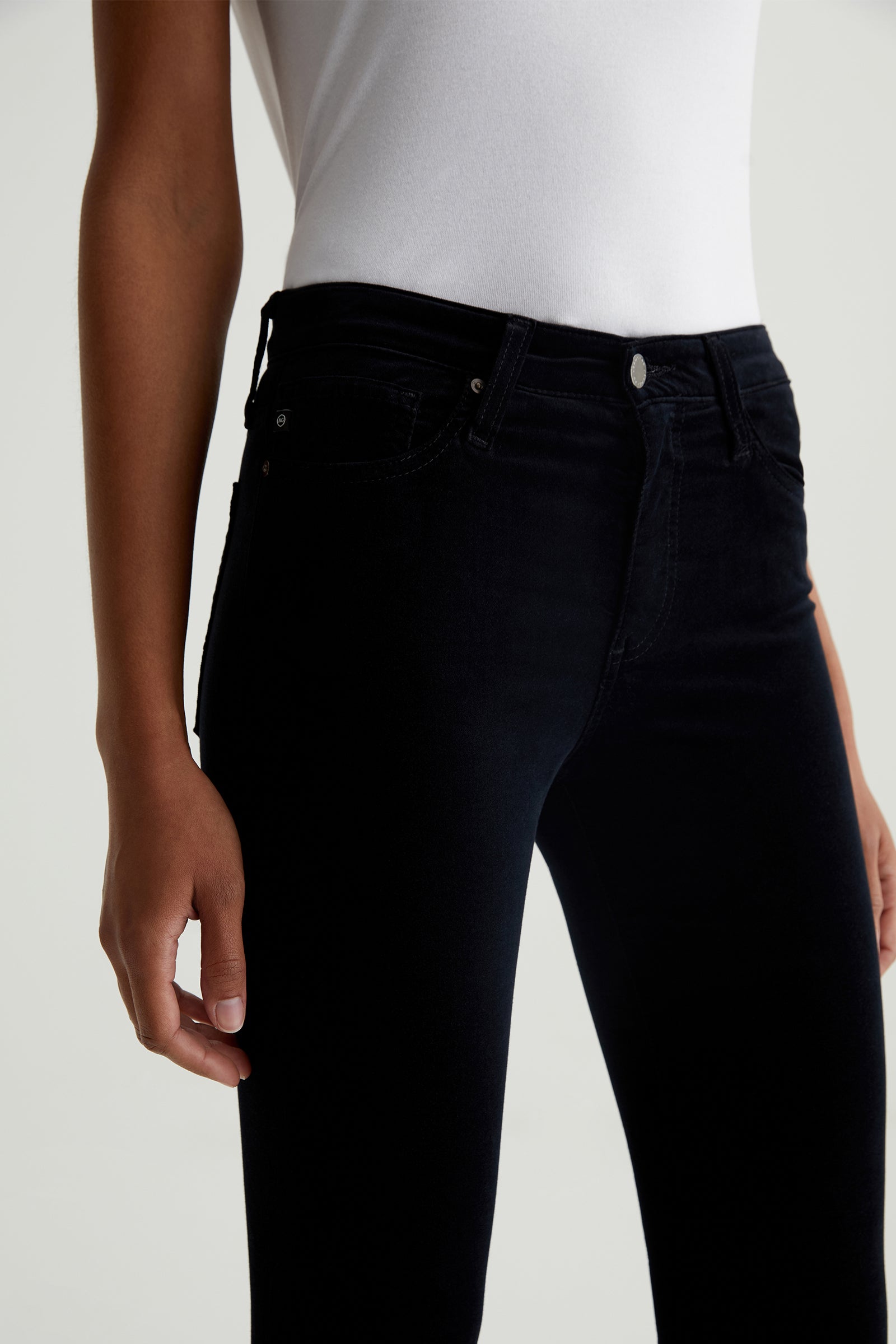 AG Farrah High-Rise Black Velvet Skinny Jeans
