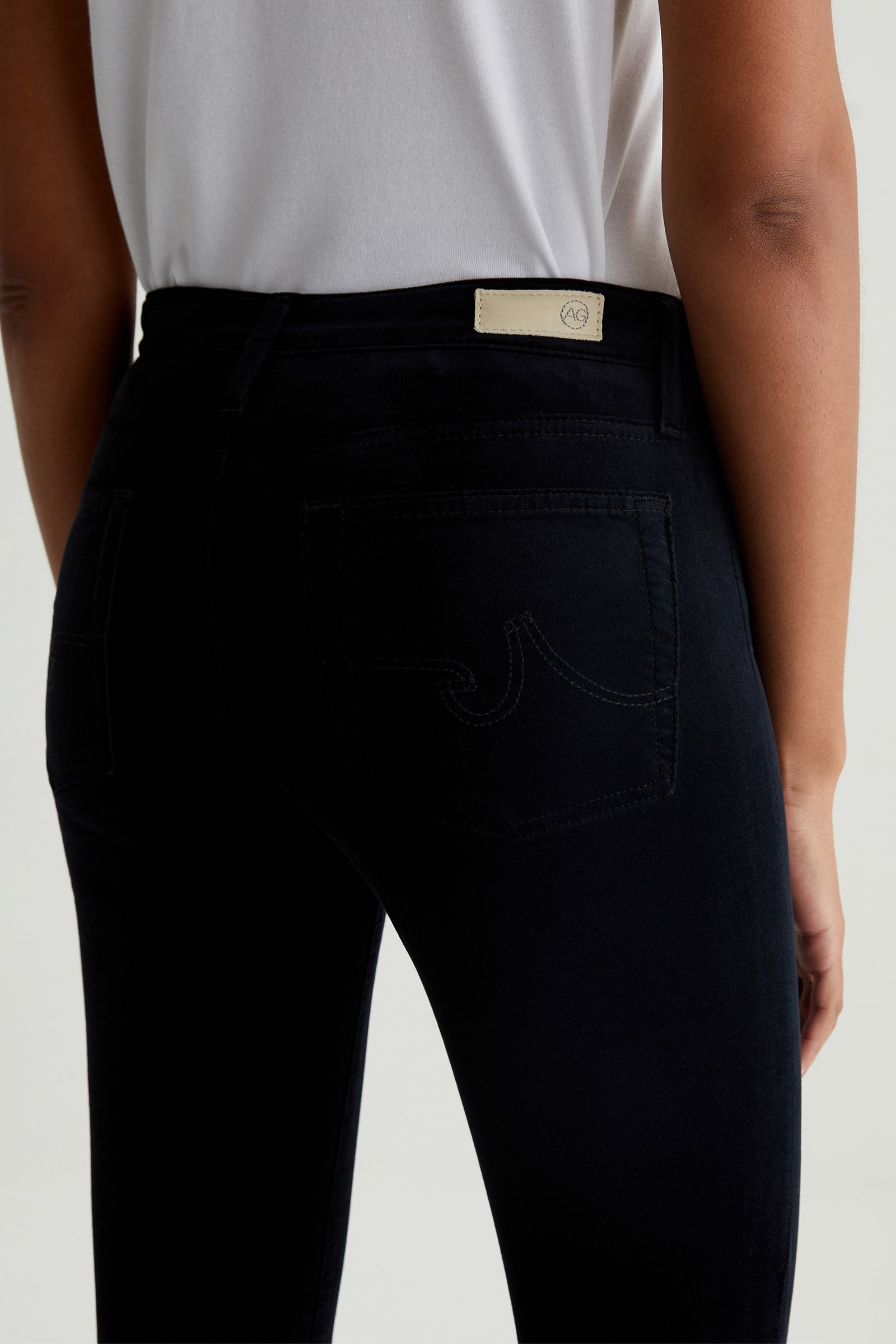 AG Farrah High-Rise Black Velvet Skinny Jeans