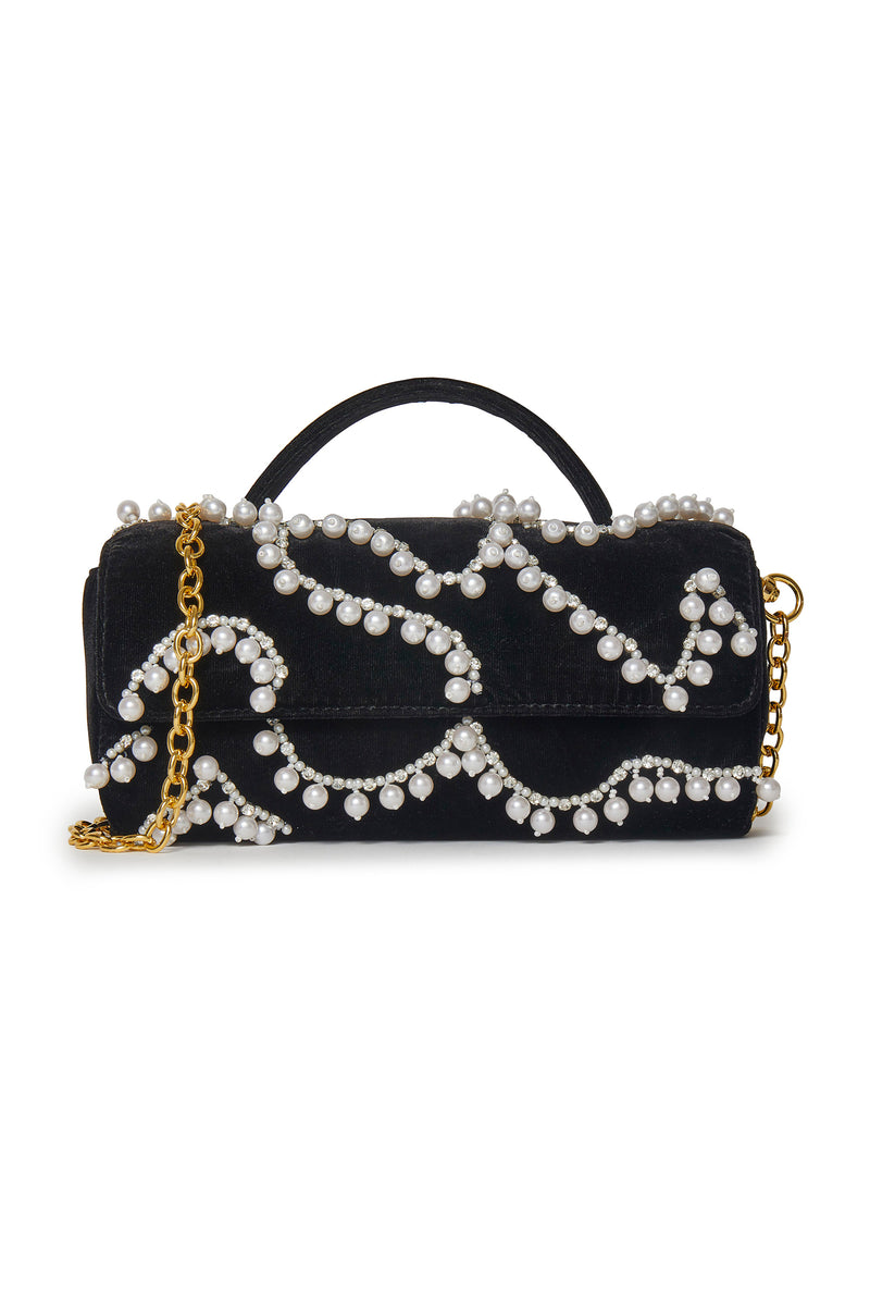 The LELE SADOUGHI MINI TABITHA BAG in Jet is a black velvet clutch decorated with wavy rows of faux pearls, featuring a gold chain strap and a small top handle.