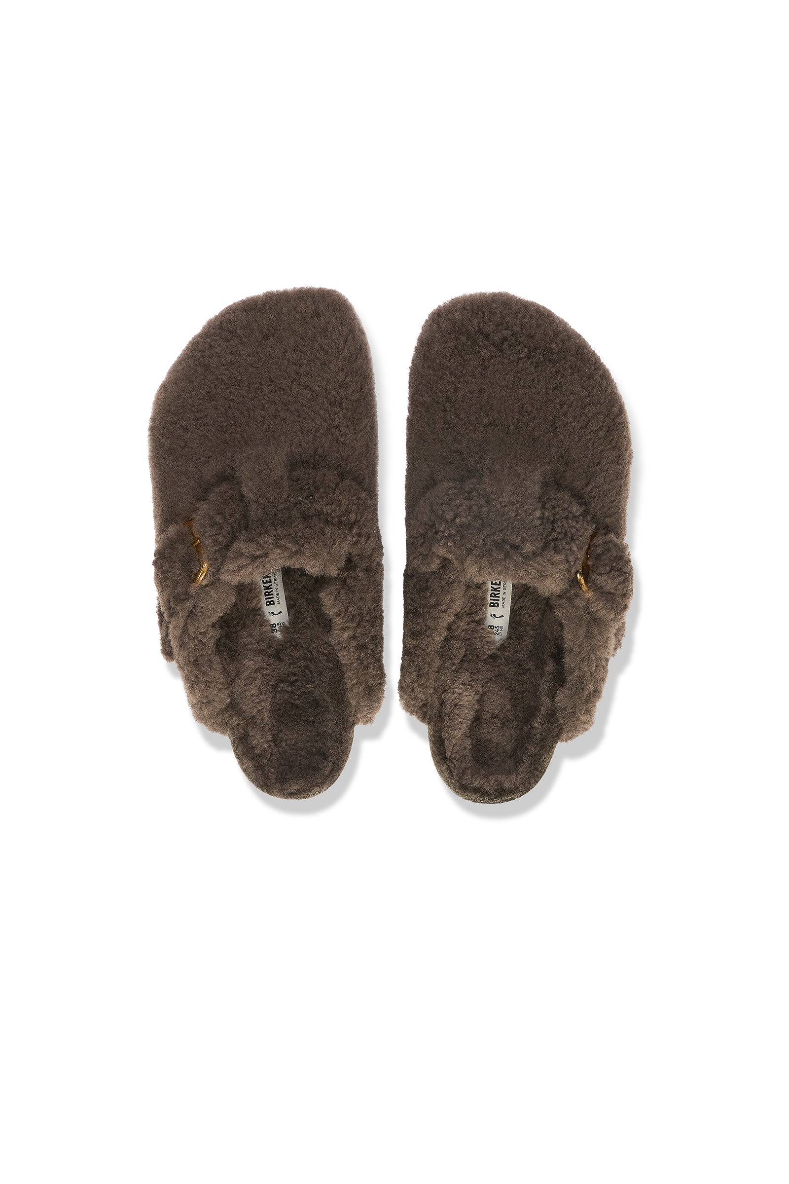 A pair of Womens Boston Big Buckle Teddy Grey Birkenstock clogs, featuring a plush texture and shearling style, shown from above on a white background.