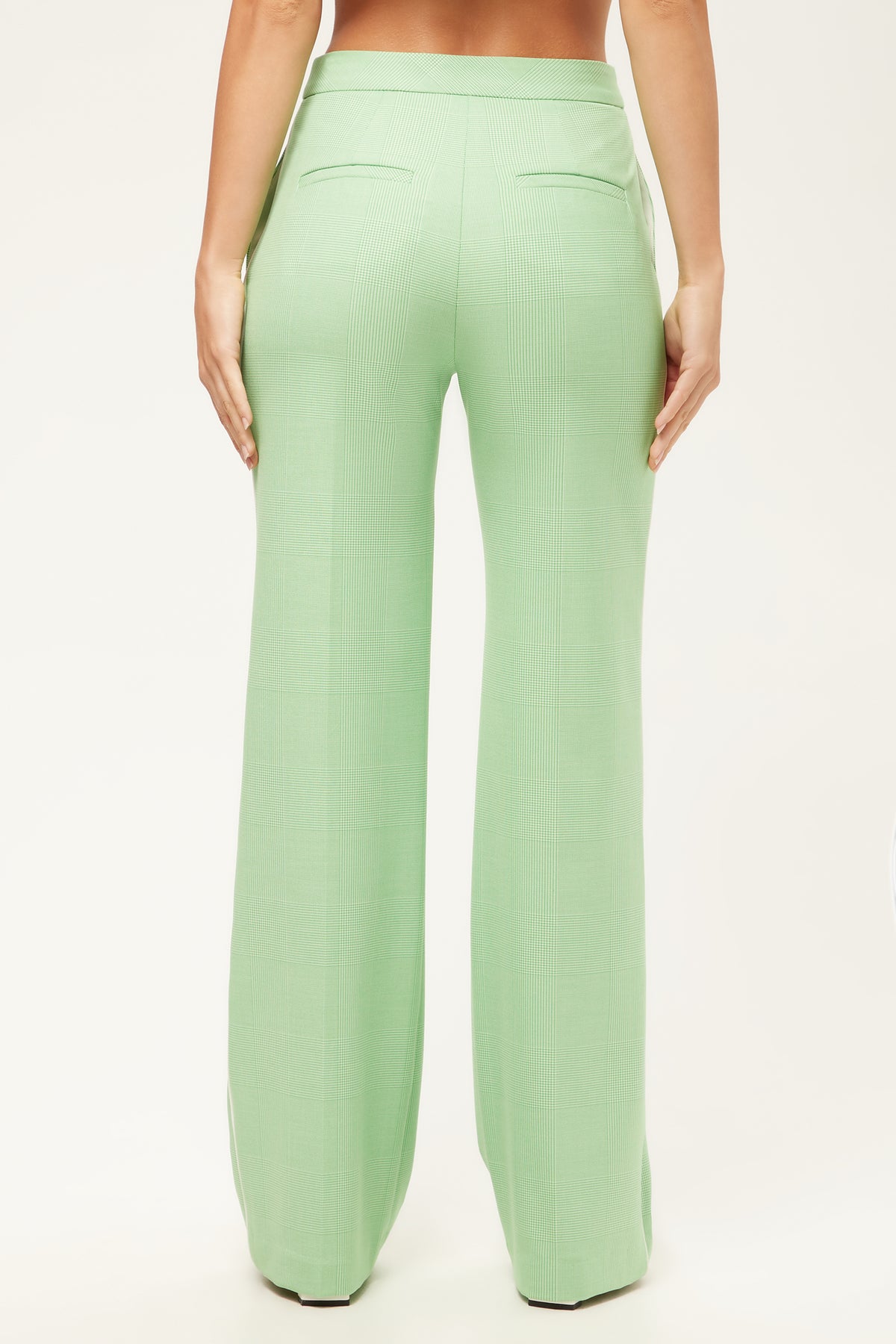 A person is shown from the back, wearing the Bjorn Wide-Leg Pant in Game Time Glen Plaid, featuring a high waist, wide legs, and two back welt pockets, standing against a plain white background.